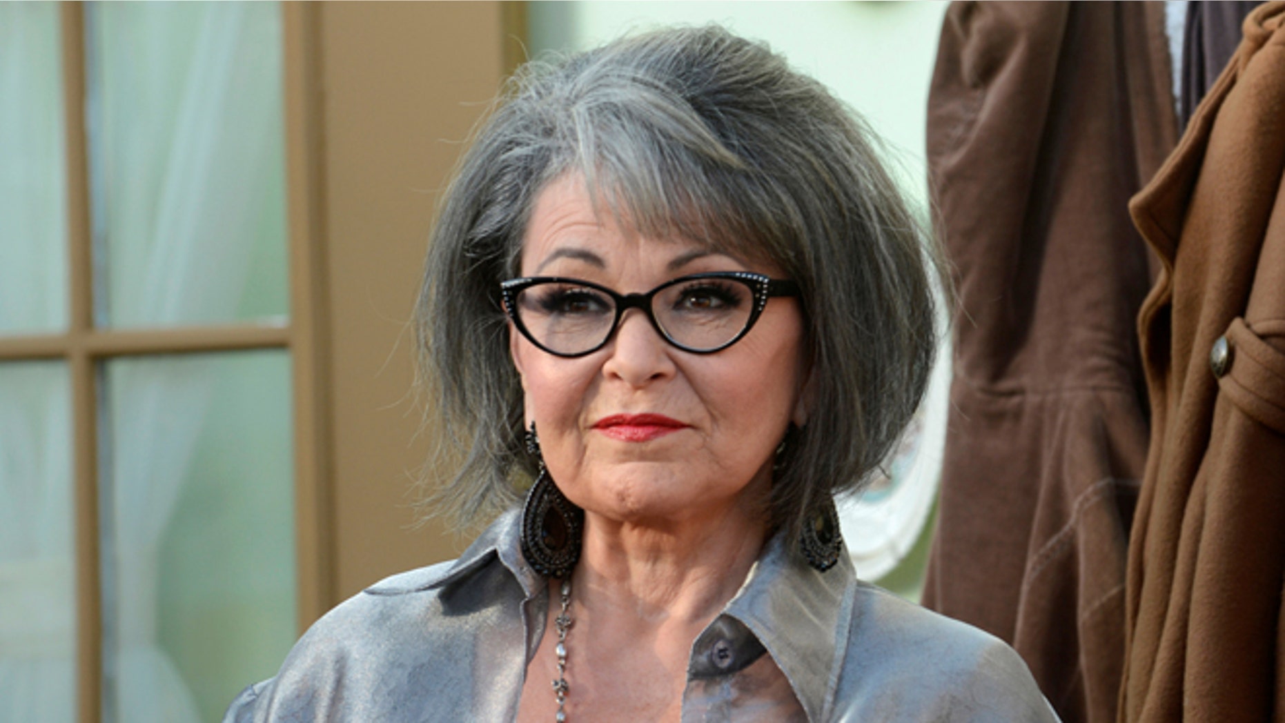 FILE PHOTO: Actress Rosanne Barr arrives for the taping of the Comedy Central Roast of Roseanne in Los Angeles, U.S., August 4, 2012. REUTERS/Phil McCarten/File Photo - RTS14E2M