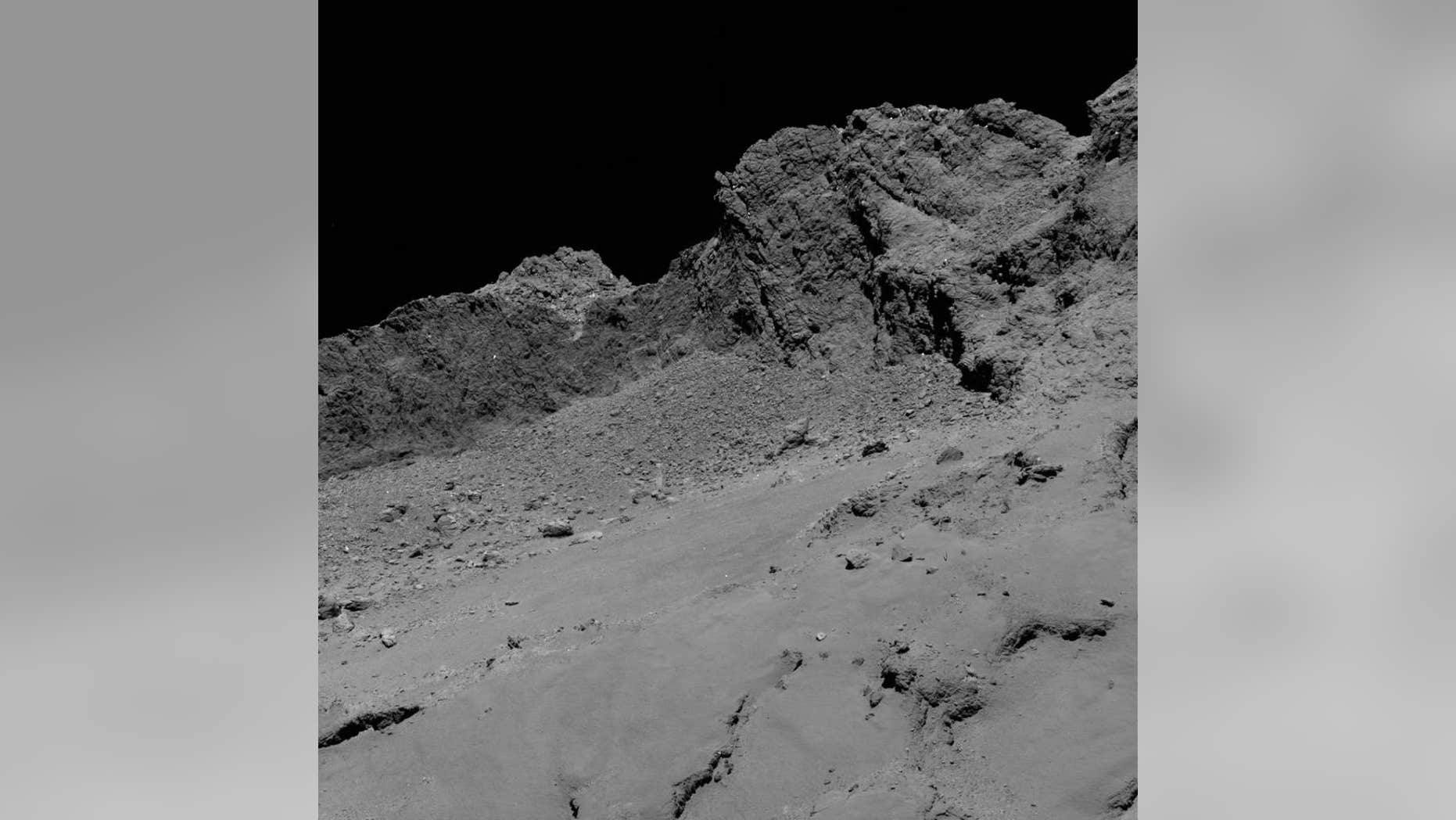 The OSIRIS narrow-angle camera aboard the Space Agency's Rosetta spacecraft captured this image of comet 67P/Churyumov-Gerasimenko on September 30, 2016, from an altitude of about 10 miles above the surface during the spacecraft’s controlled descent.