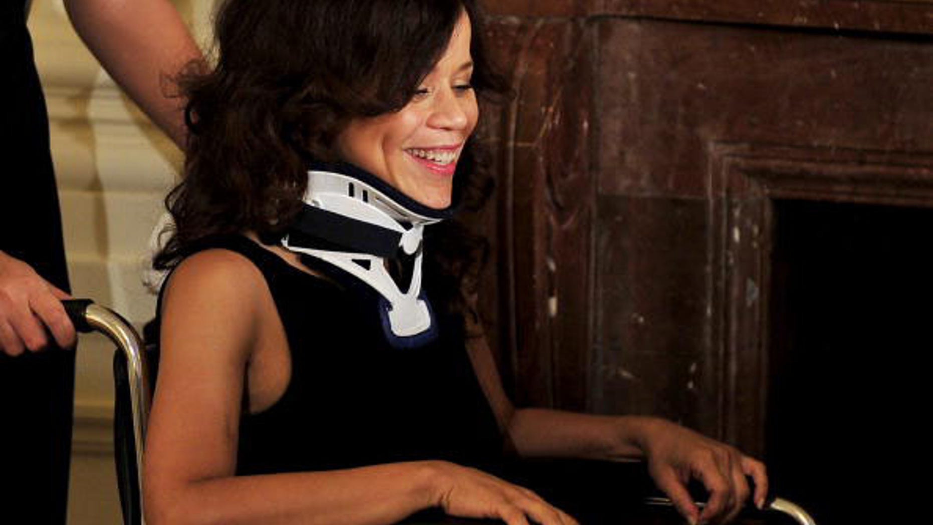 WASHINGTON - JULY 13: (AFP OUT) Actress Rosie Perez awaits the arrival of U.S. President Barack Obama to speak about the new National HIV/AIDS Strategy (NHAS) in the East Room of the White House July 13, 2010 in Washington, DC. The strategy, unveiled today by the White House, aims to use federal inter-agency and inter-department resources to reduce the number of people who become infected with HIV, increase access to care and optimizing health outcomes for people living with HIV and reduce HIV-related health disparities. (Photo by Ron Sachs-Pool/Getty Images)