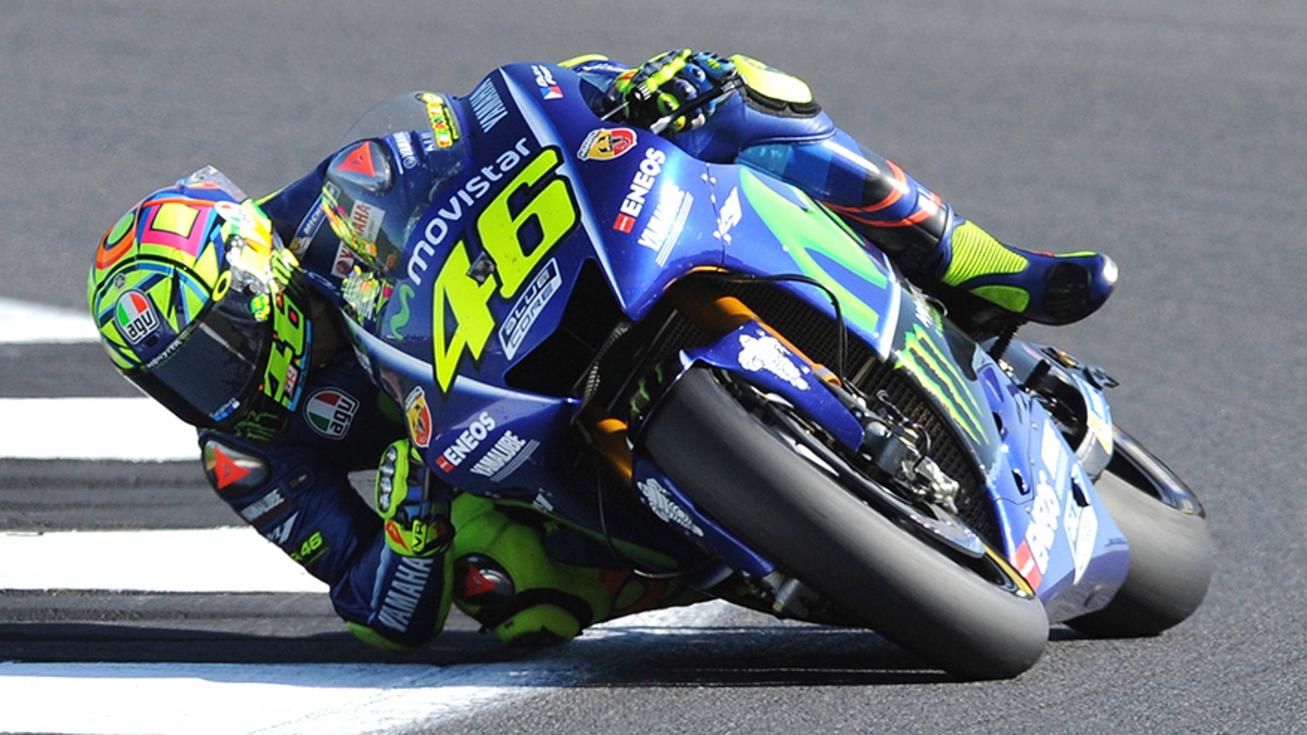 Italy's Valentino Rossi of Movistar Yamaha steers his bike during the Moto GP race at the British Grand Prix at Silverstone, England, Sunday, Aug. 27, 2017. (AP Photo/Rui Vieira)