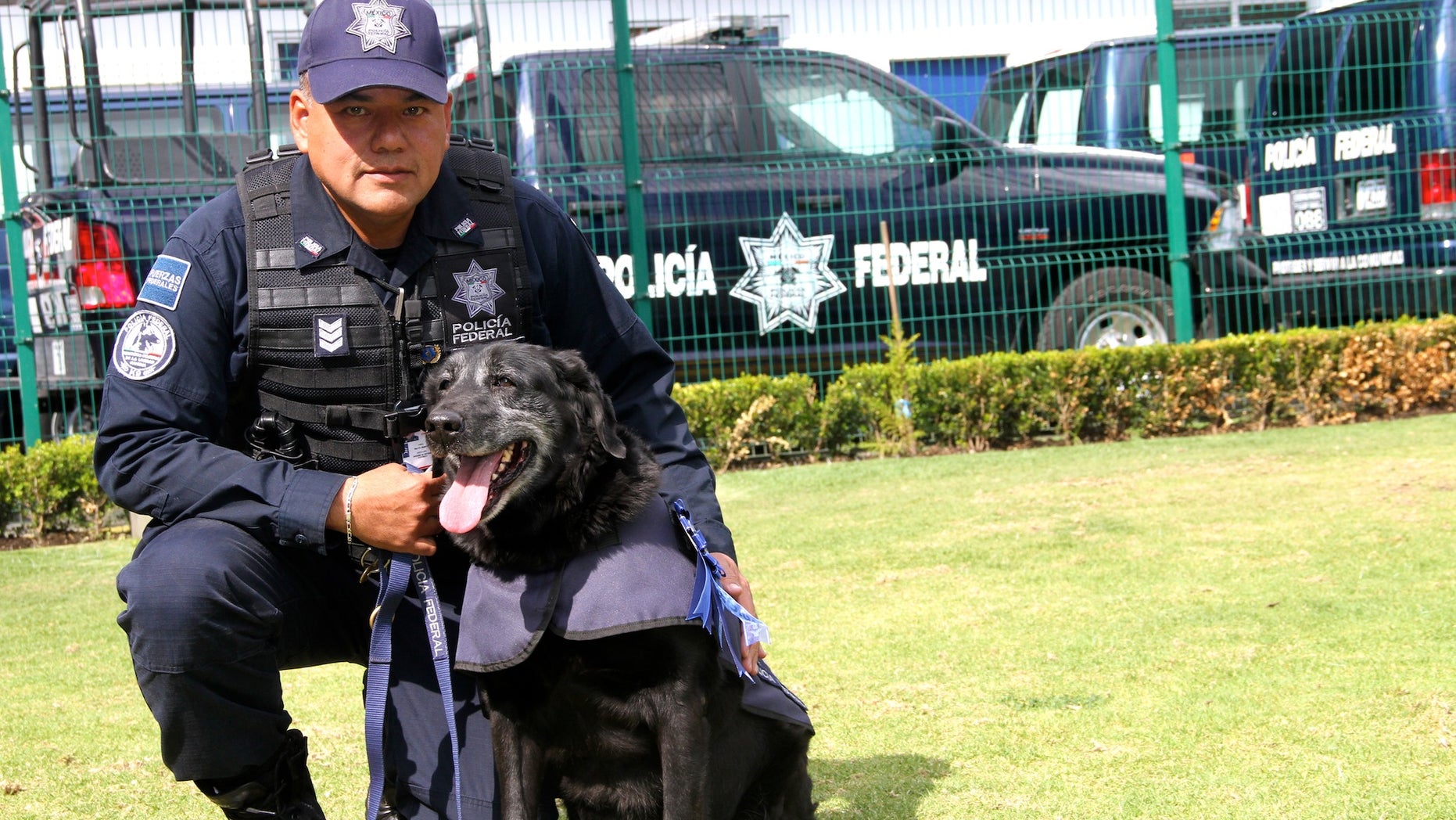 Deputy Officer Jorge Luis López and Rosty.
