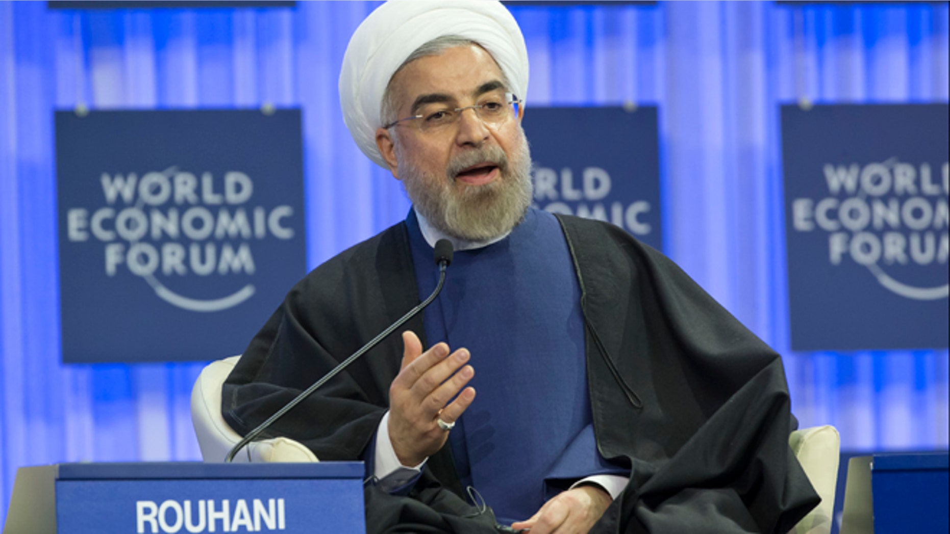 Jan. 23, 2014: Iranian President Hassan Rouhani gestures as speaks during a session of the World Economic Forum in Davos, Switzerland.