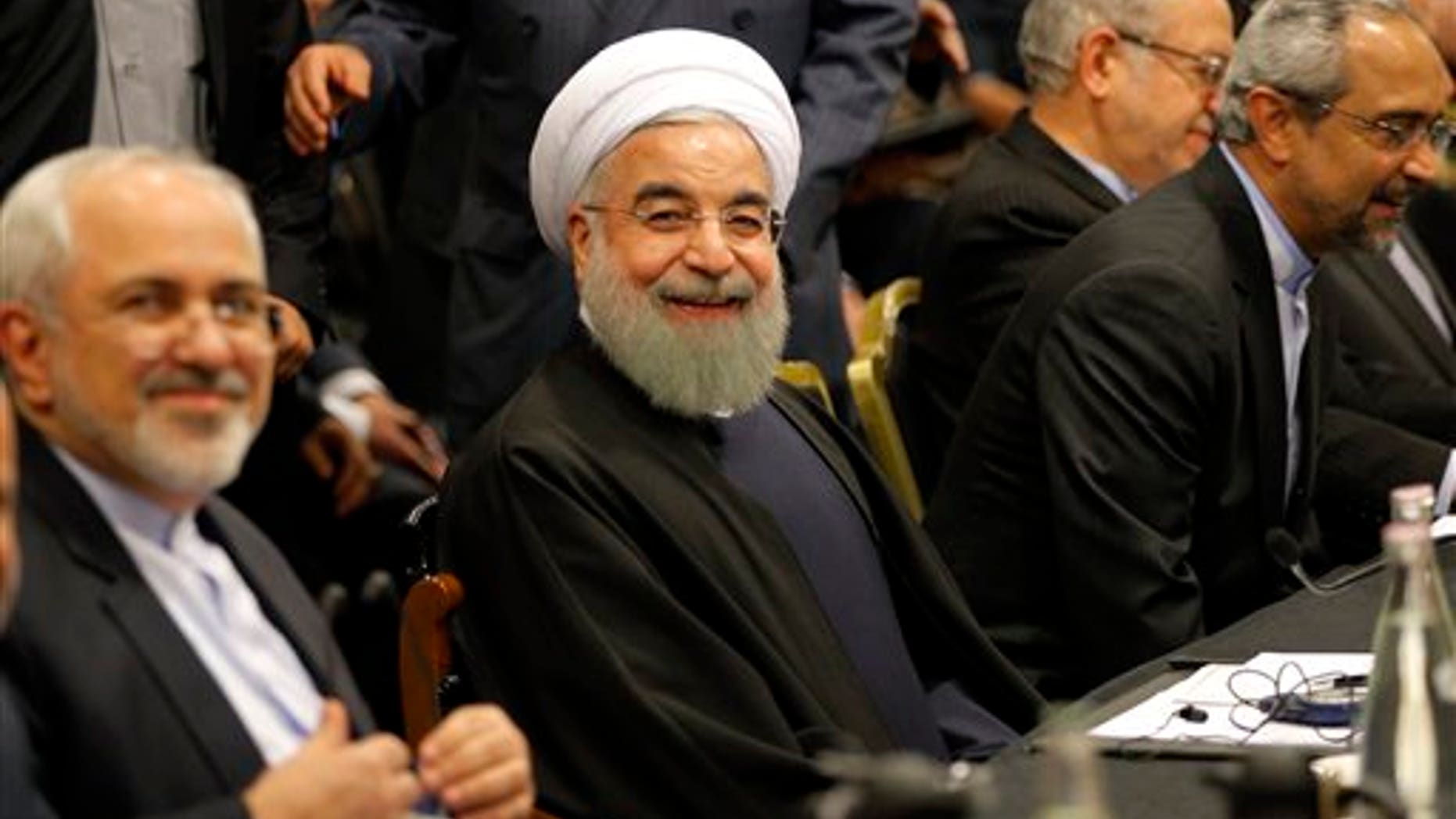 Iranian President Hassan Rouhani smiles ahead of a meeting in Paris, Wednesday, Jan. 27, 2016. Rouhani says his first visit to Europe since the nuclear accord was signed has proven that there are "great possibilities" for economic, academic, scientific and cultural cooperation and that "today we are in a win-win situation" after years of mutual losses due to sanctions. (AP Photo/Christophe Ena)