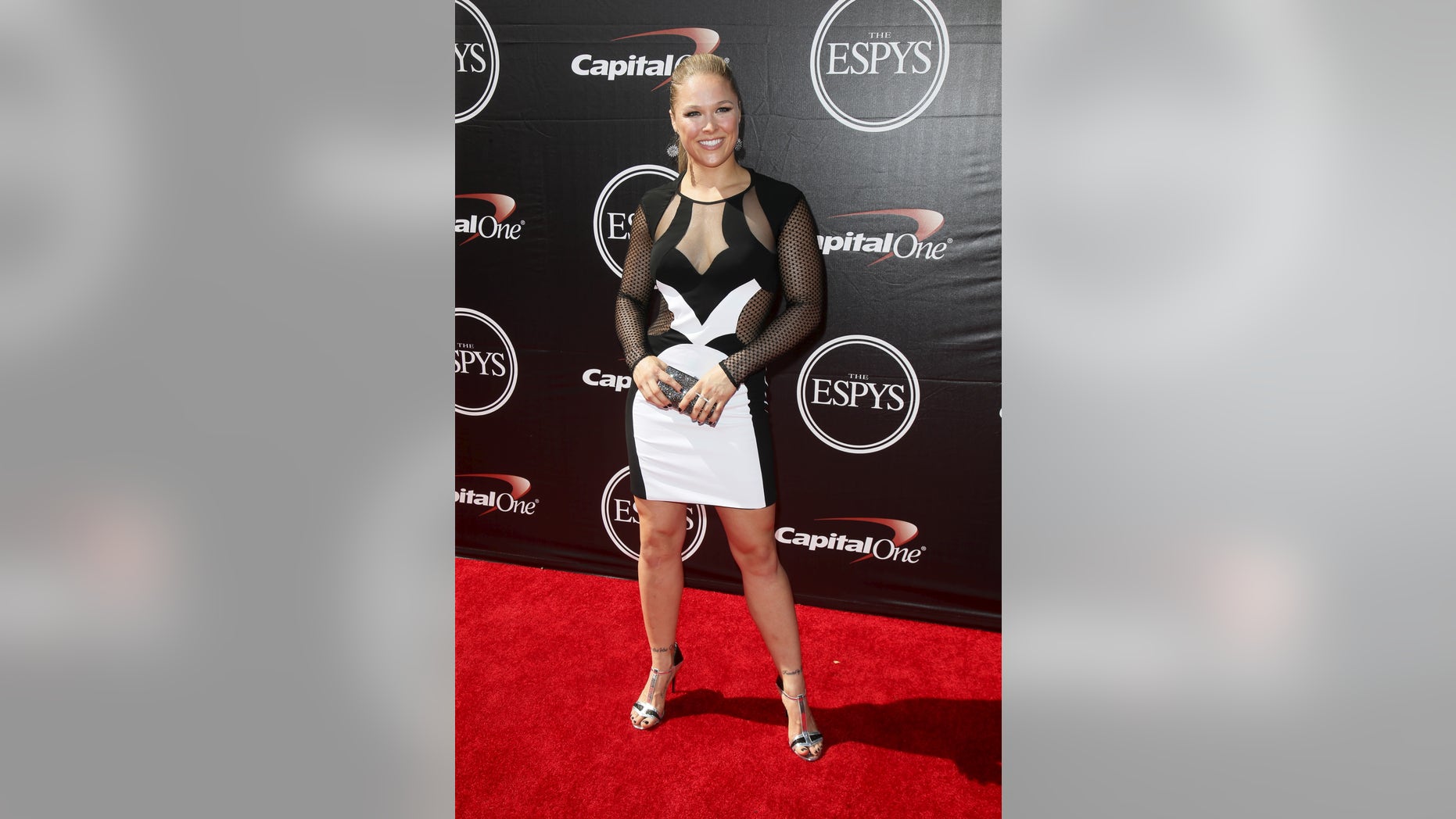 July 15, 2015. UFC fighter Ronda Rousey arrives for the 2015 ESPY Awards in Los Angeles, California.