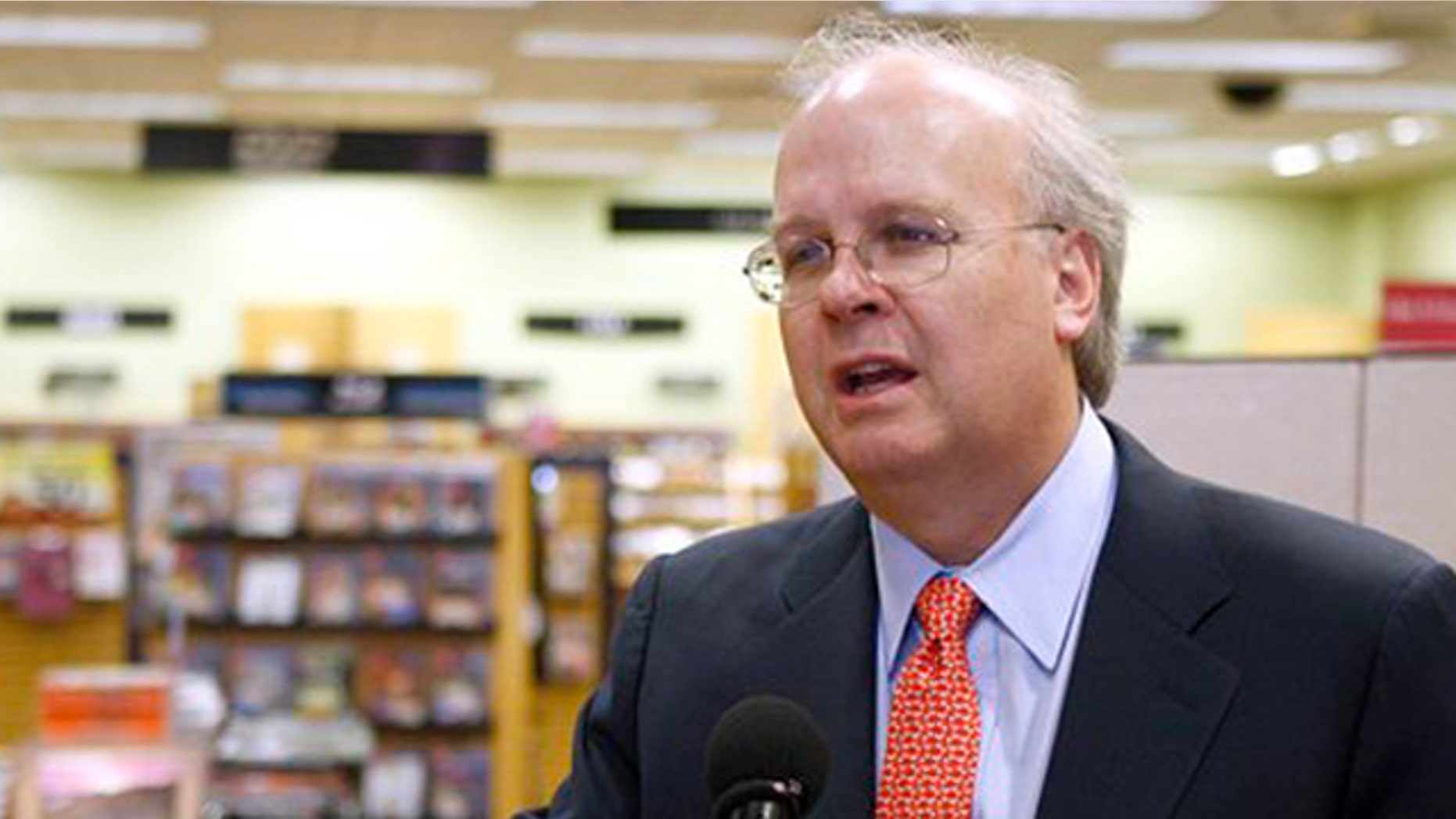 In this May 17 file photo, former White House adviser Karl Rove gestures in Oklahoma City, Okla. (AP Photo)