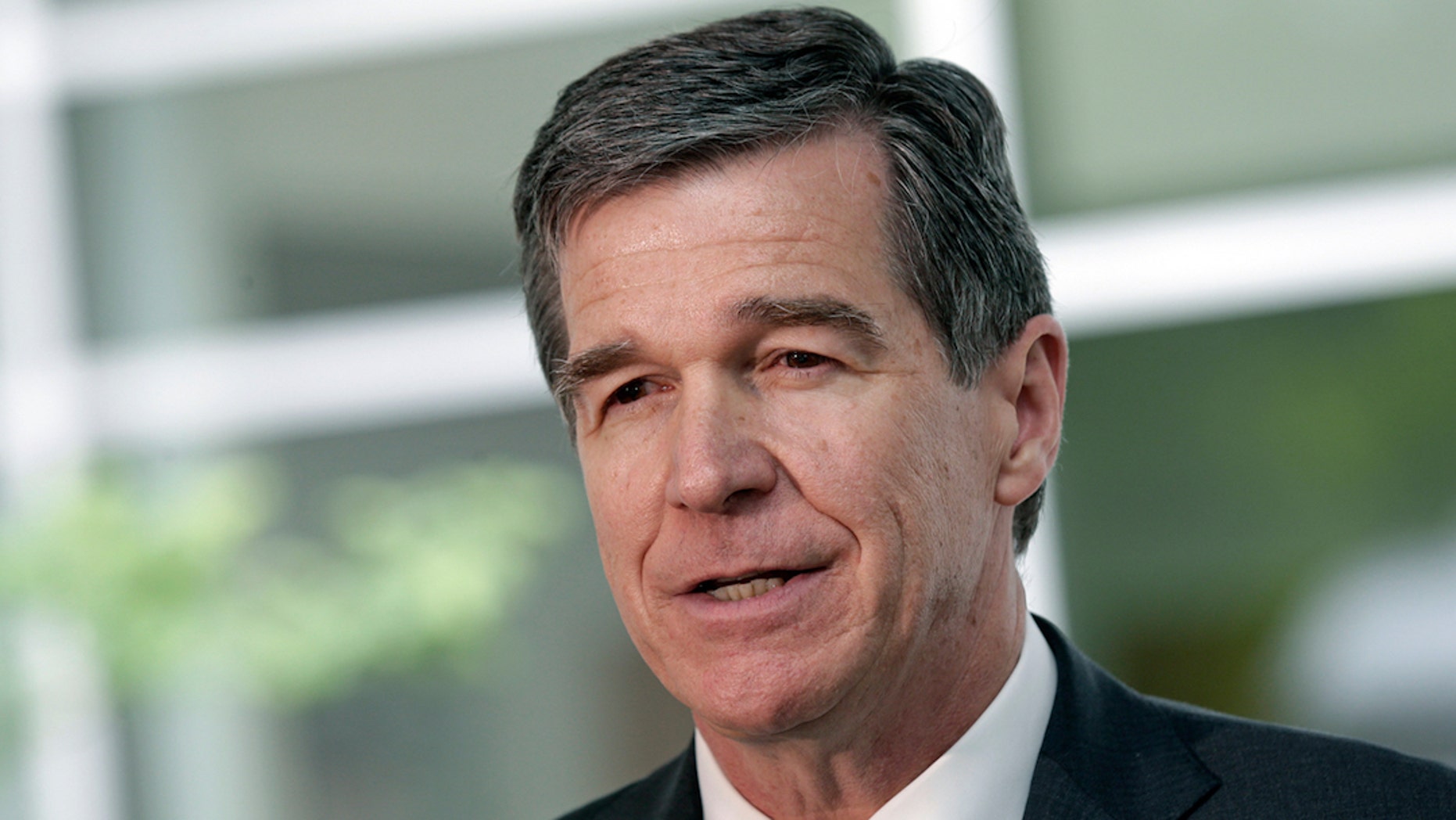 Gov. Roy Cooper of North Carolina now makes less than his Cabinet members after giving them hefty pay raises.