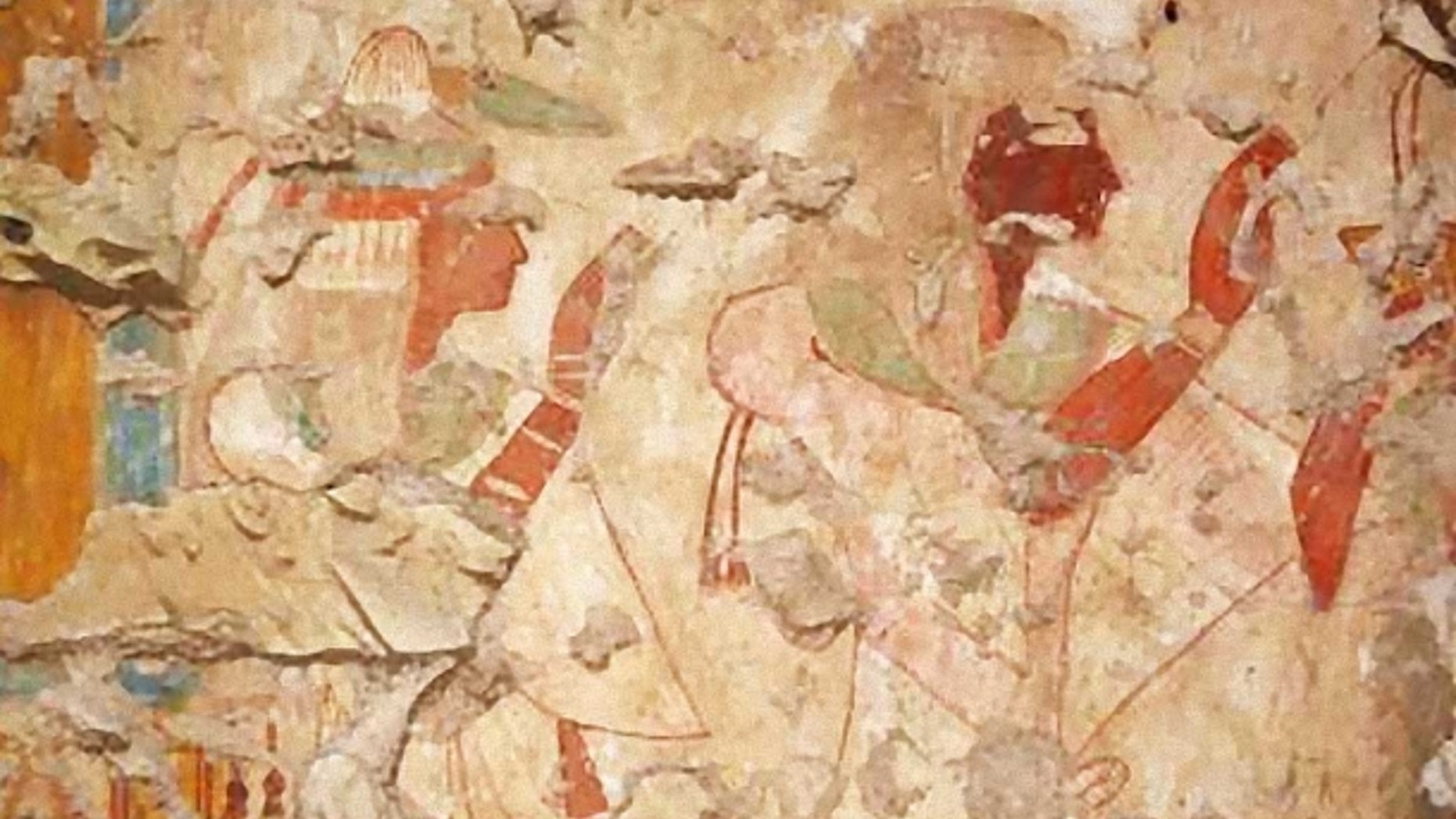 Khonsu and his wife worship the gods Osiris and Isis (Waseda University).