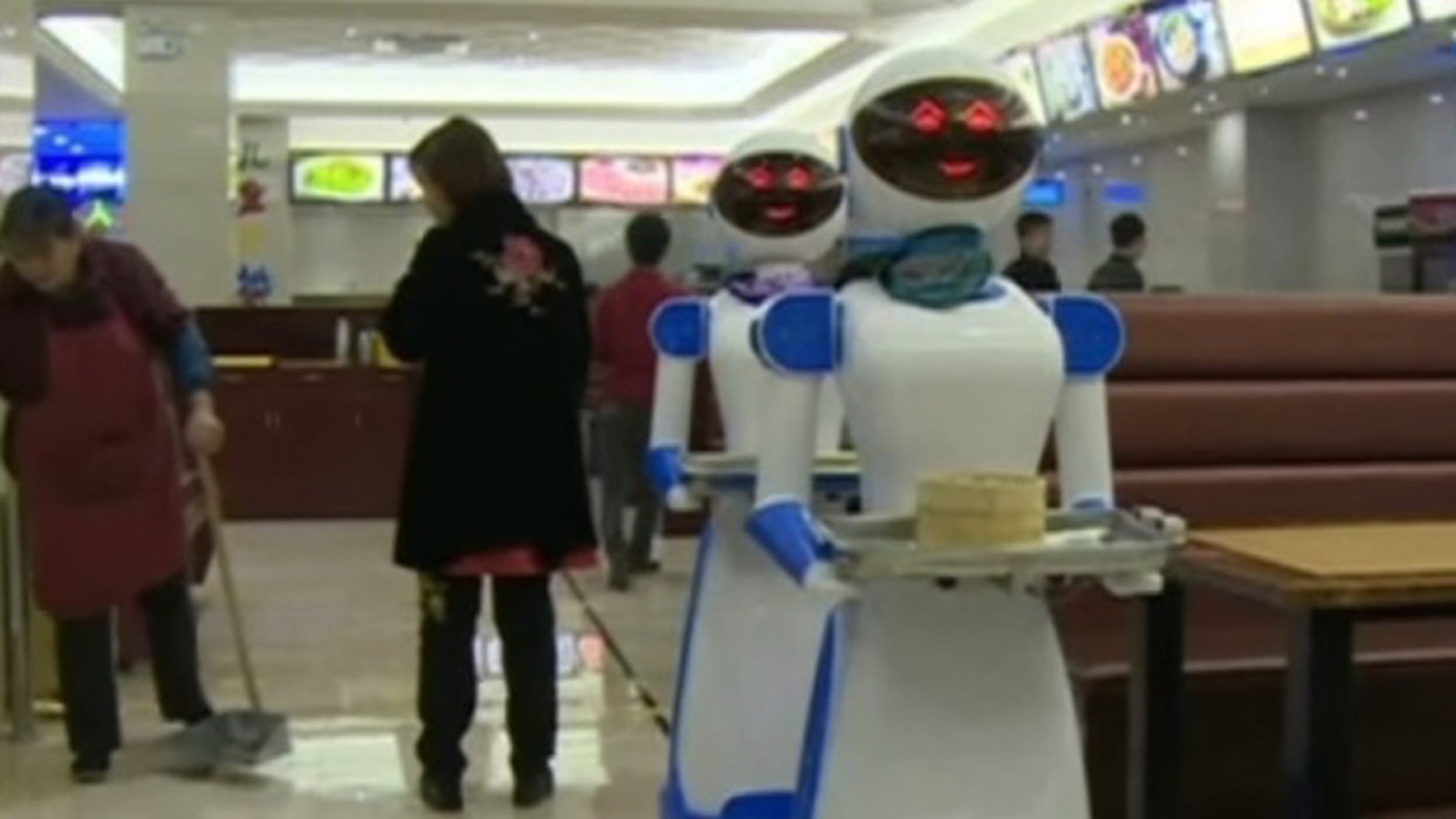 Robots deliver food at this Chinese restaurant.