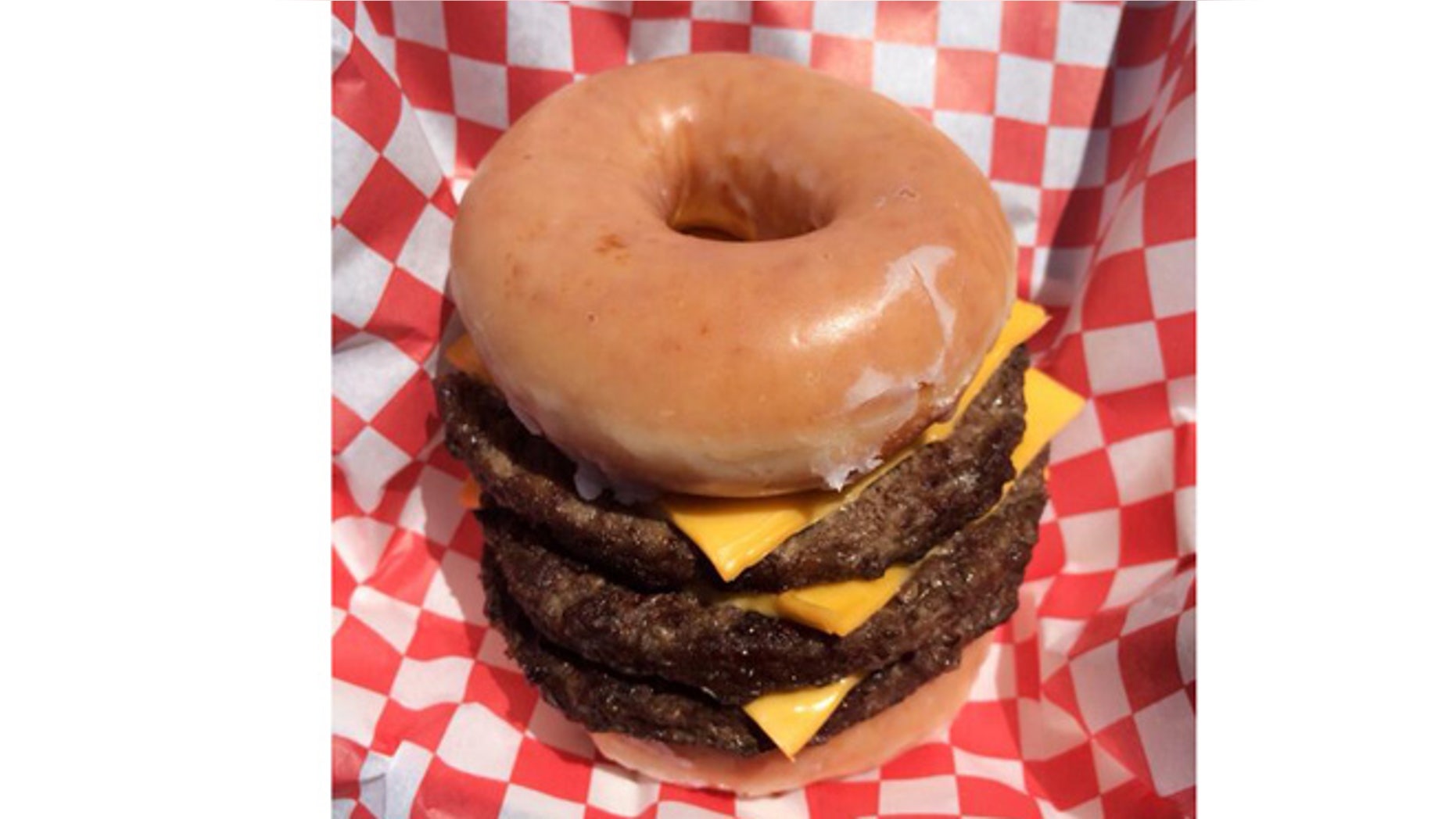 Introducing a triple-decker Krispy Kreme cheeseburger.