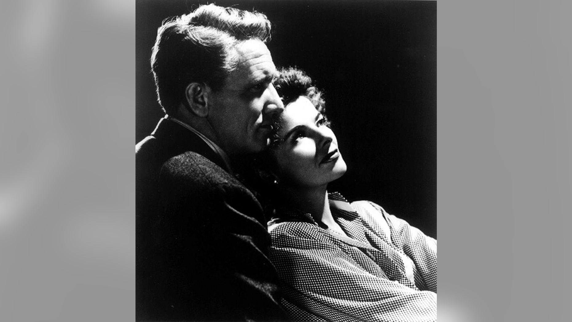 Actress Katharine Hepburn is shown with actor Spencer Tracy in a 1945 photo from the film "Without Love."