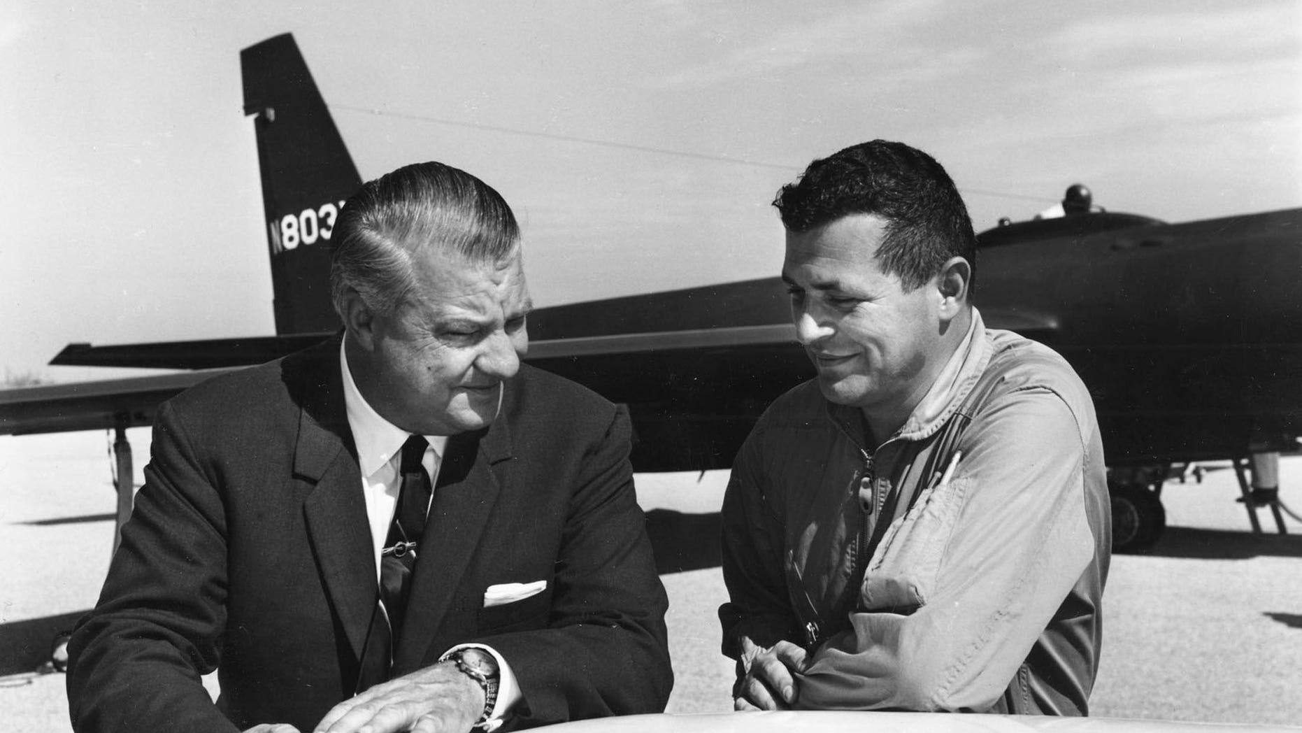 Pilot Francis Gary Powers (R) speaks with U-2 designer Kelly Johnson in this 1966 U.S. Air Force handout photo.