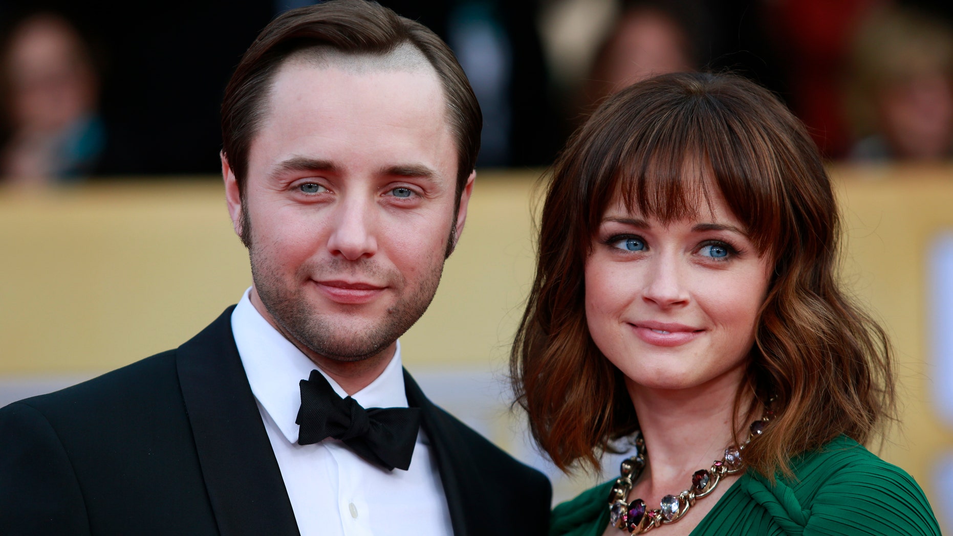 Actors Vincent Kartheiser and Alexis Bledel of the TV drama "Mad Men" arrive at the 19th annual Screen Actors Guild Awards in Los Angeles, California January 27, 2013. REUTERS/Adrees Latif (UNITED STATES - Tags: ENTERTAINMENT) (SAGAWARDS-ARRIVALS) - RTR3D2AD