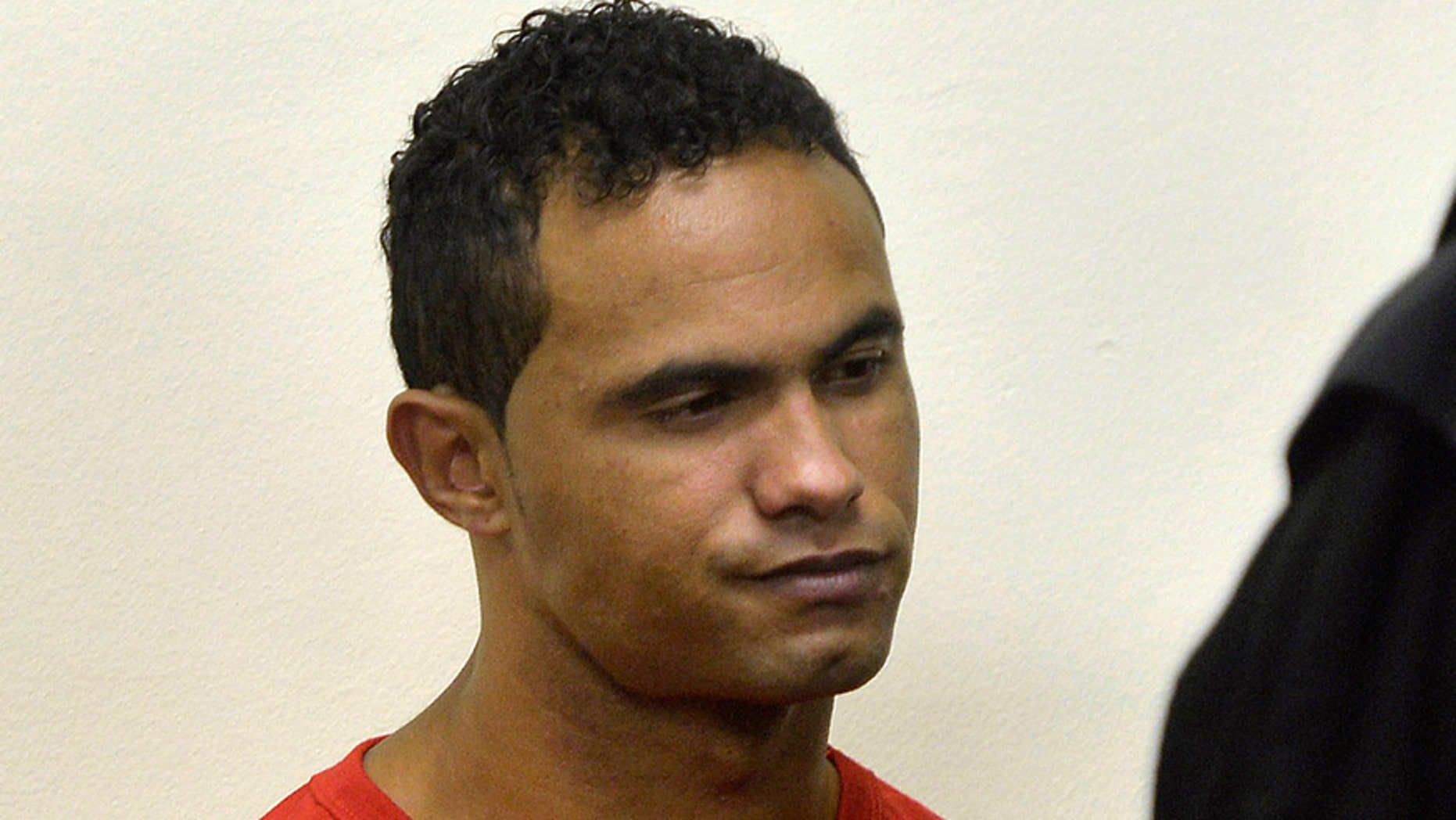 Bruno Souza, former goalkeeper of Brazil's Flamengo soccer club, sits in court during his trial in Contagem, near Belo Horizonte, March 4, 2013. Souza is on trial on charges of the murder of his ex-girlfriend Eliza Samudio, who disappeared in 2010, a few months after giving birth to what Samudio said is Souza's child. REUTERS/Pedro Vilela (BRAZIL - Tags: SPORT SOCCER CRIME LAW) - RTR3EKM7