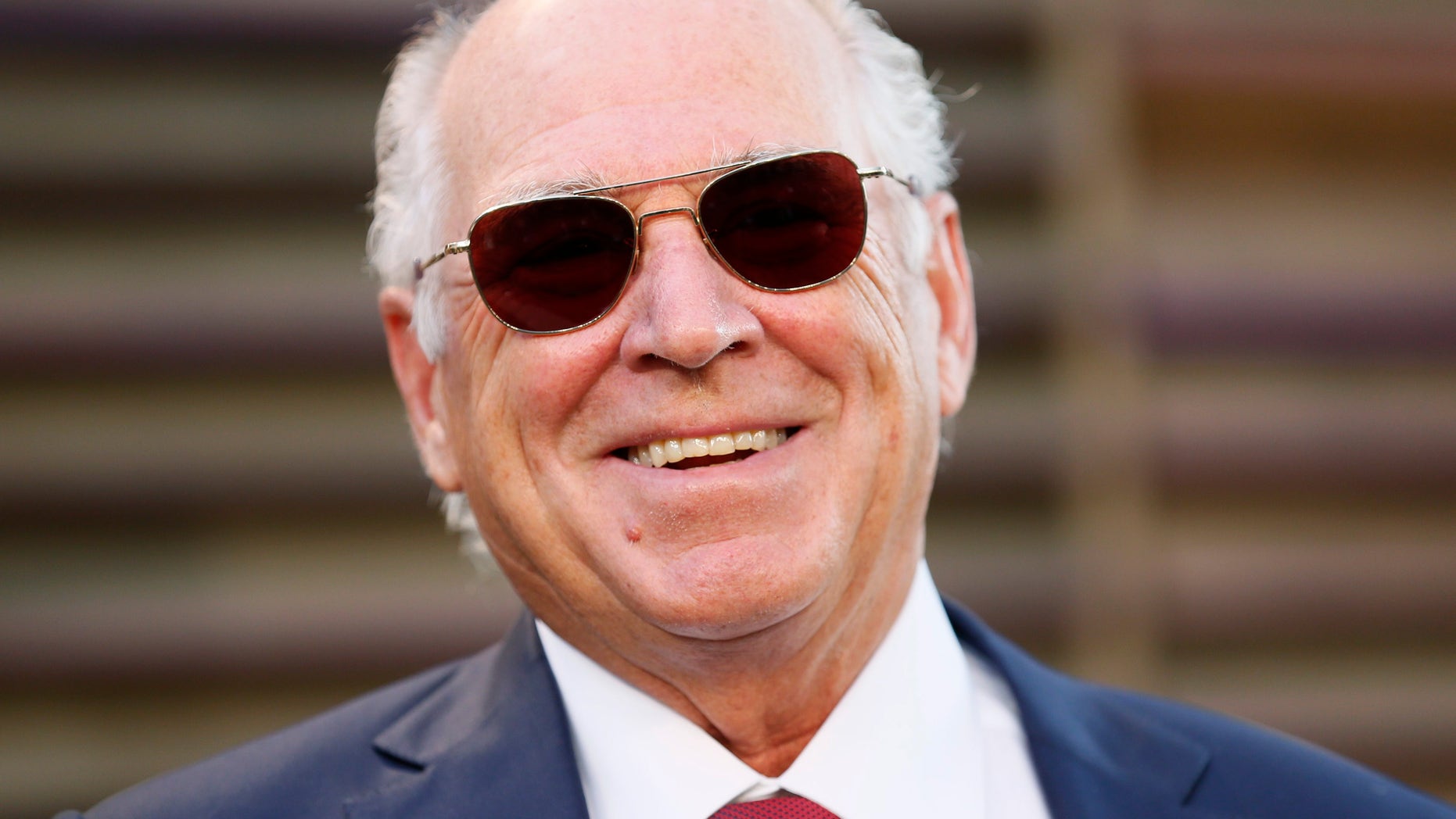 File photo: Musician Jimmy Buffett arrives at the 2014 Vanity Fair Oscars Party in West Hollywood, California March 2, 2014. (REUTERS/Danny Moloshok)