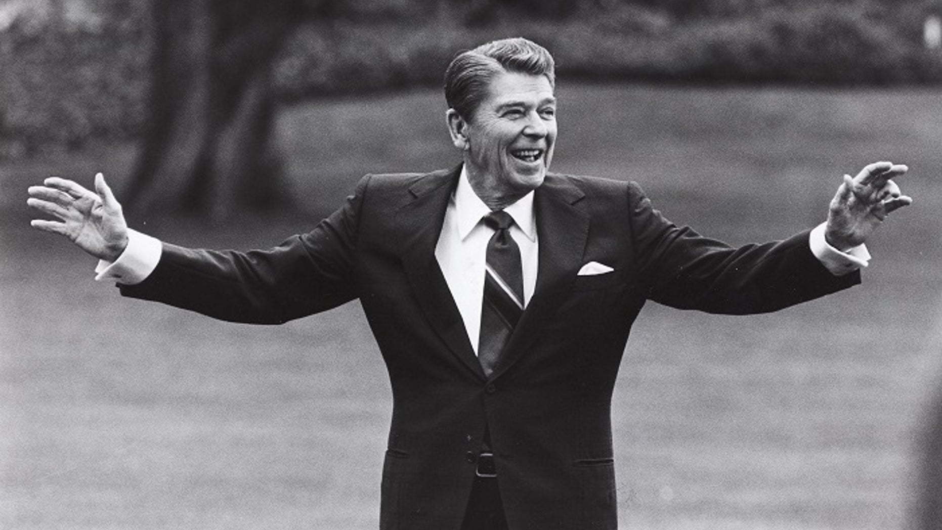 FILE -- Reagan is pictured waving to well-wishers on the south lawn of the White House on April 25, 1986.