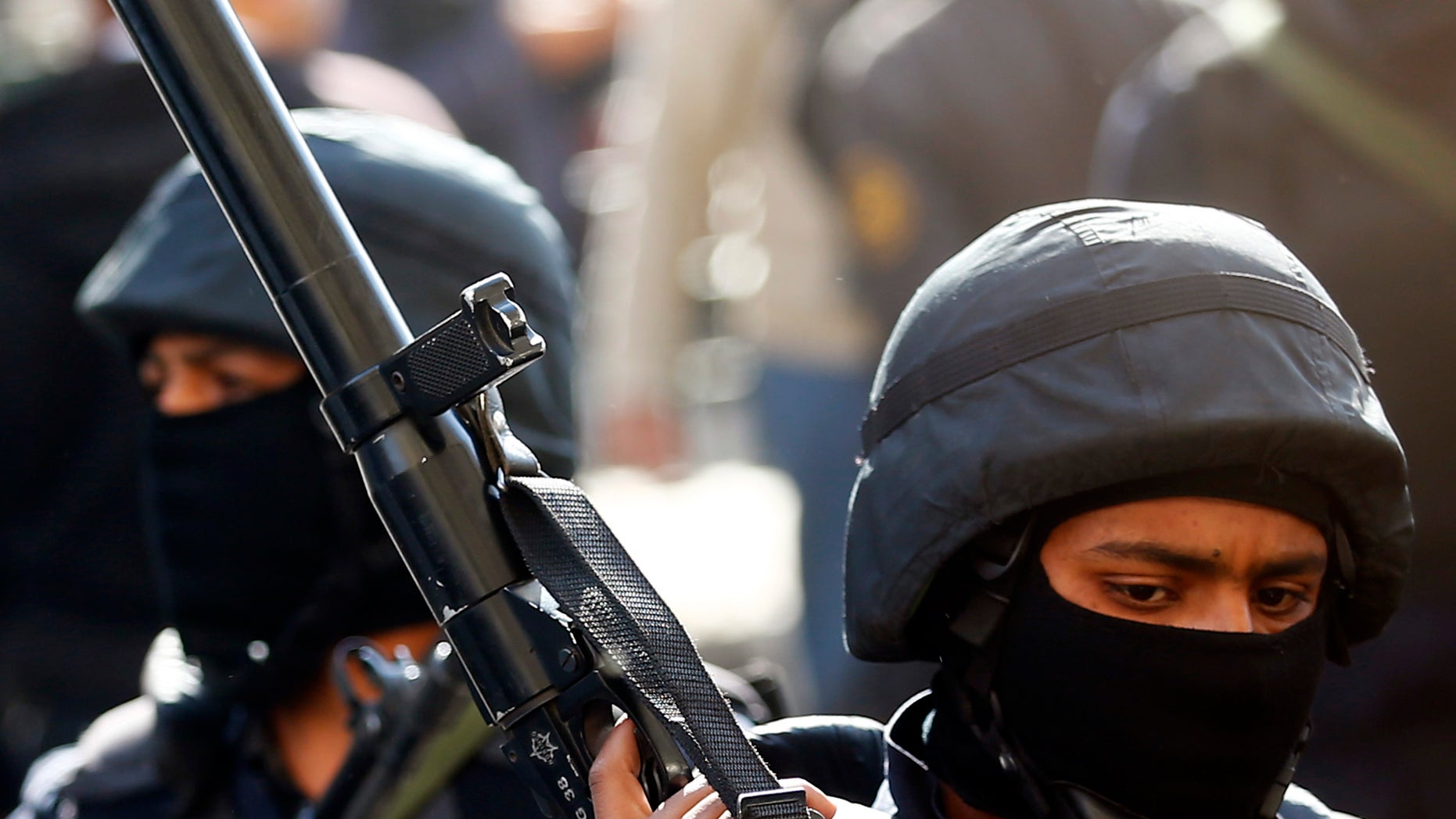 Egyptian police in protective gear.