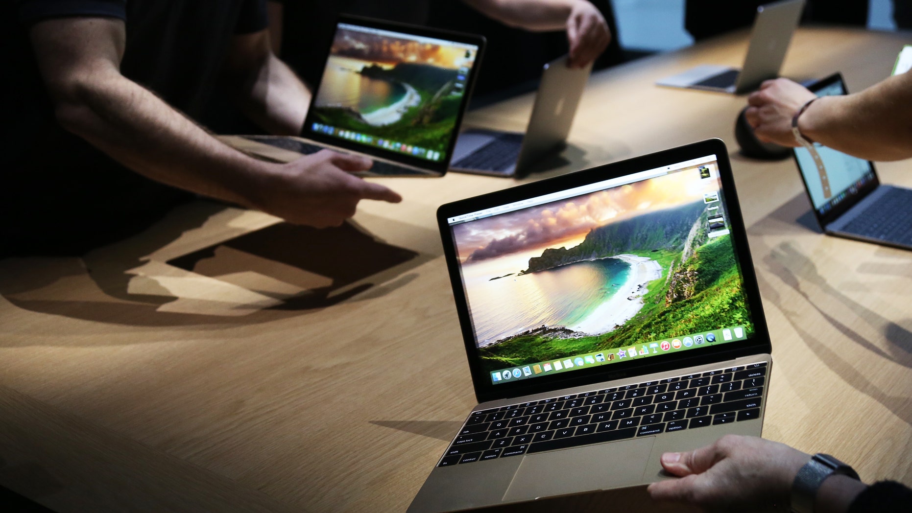 Apple's new MacBooks are displayed following an Apple event in San Francisco, California March 9, 2015.