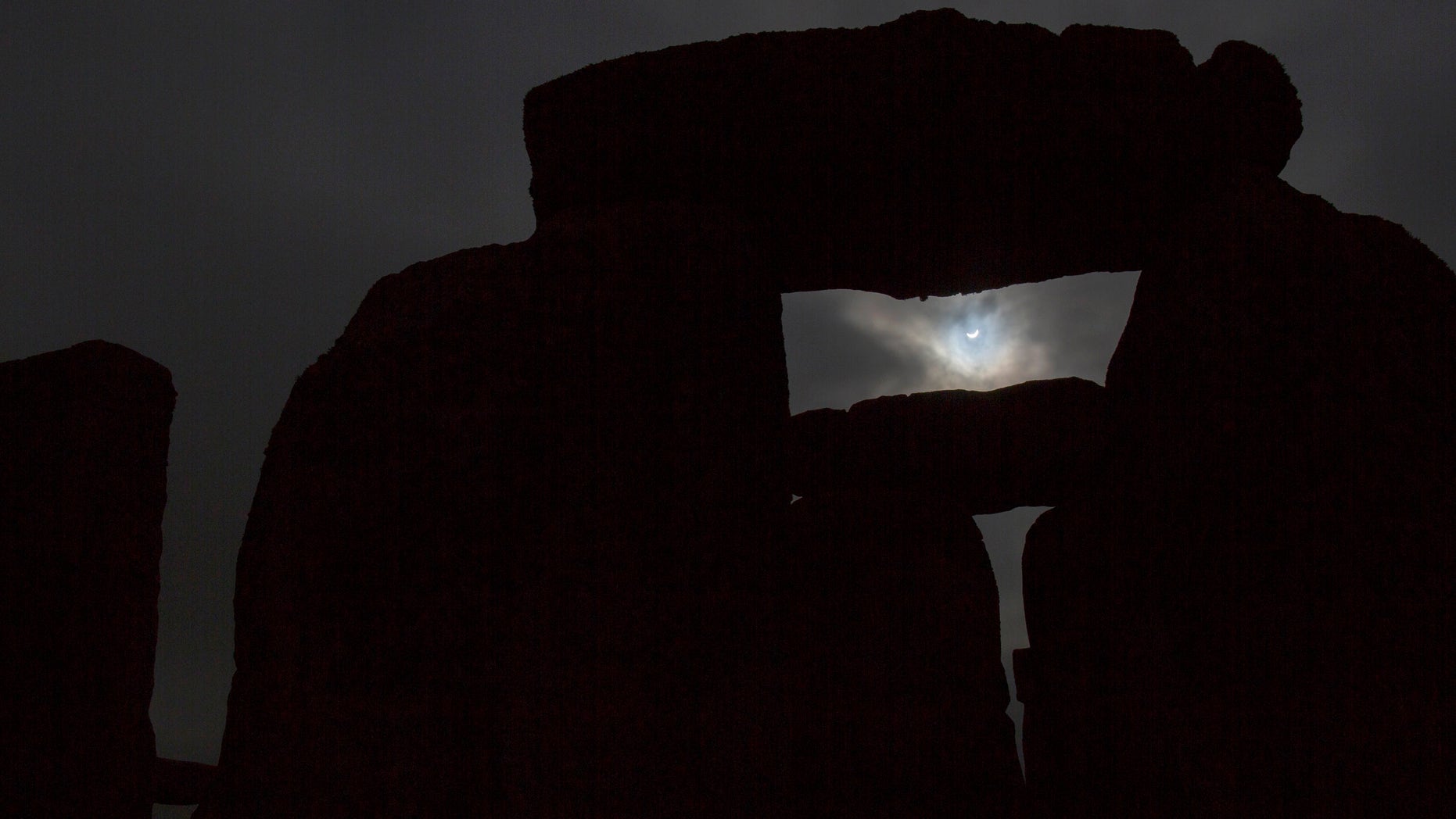 File photo: The solar eclipse is seen over Stonehenge on Salisbury Plain, Salisbury, southern England March 20, 2015. (REUTERS/Kieran Doherty)