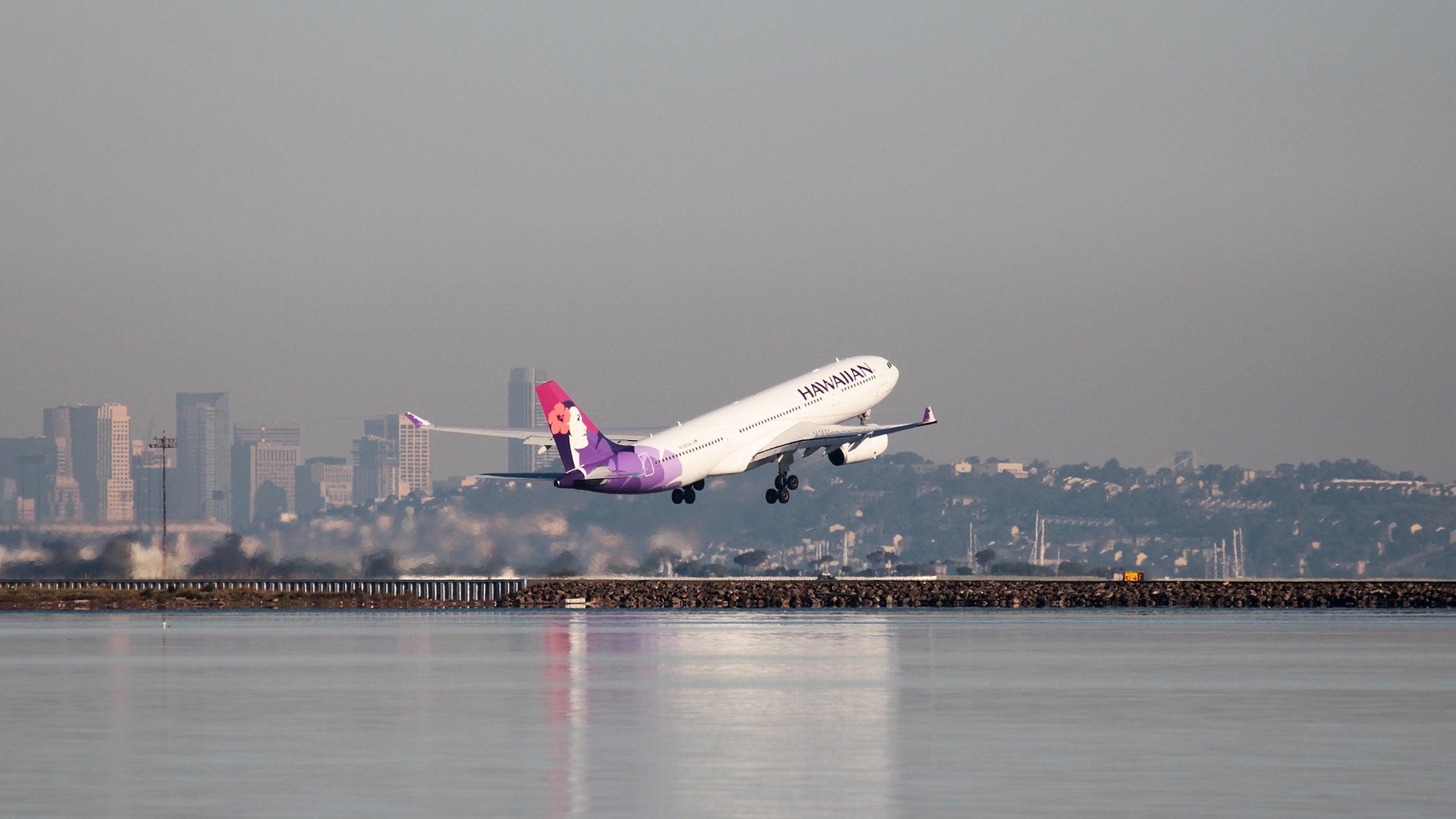 A file photo of a Hawaiian Airlines flight departing. The airline managed to take passengers "back in time" after a flight leaving New Zealand on Monday arrived in Hawaii on Sunday due to the time difference.