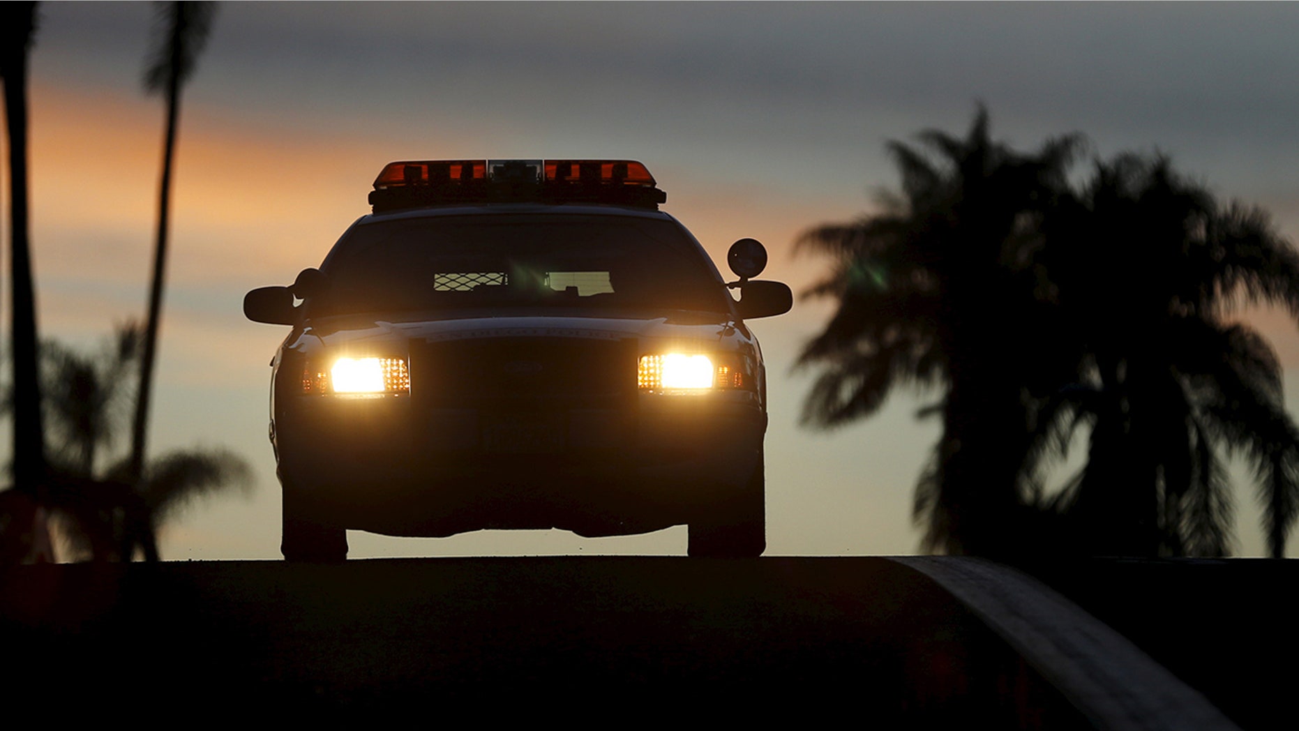 San Diego police said a man with a shotgun held up a 7-Eleven before having to break into his getaway car after locking the keys inside.