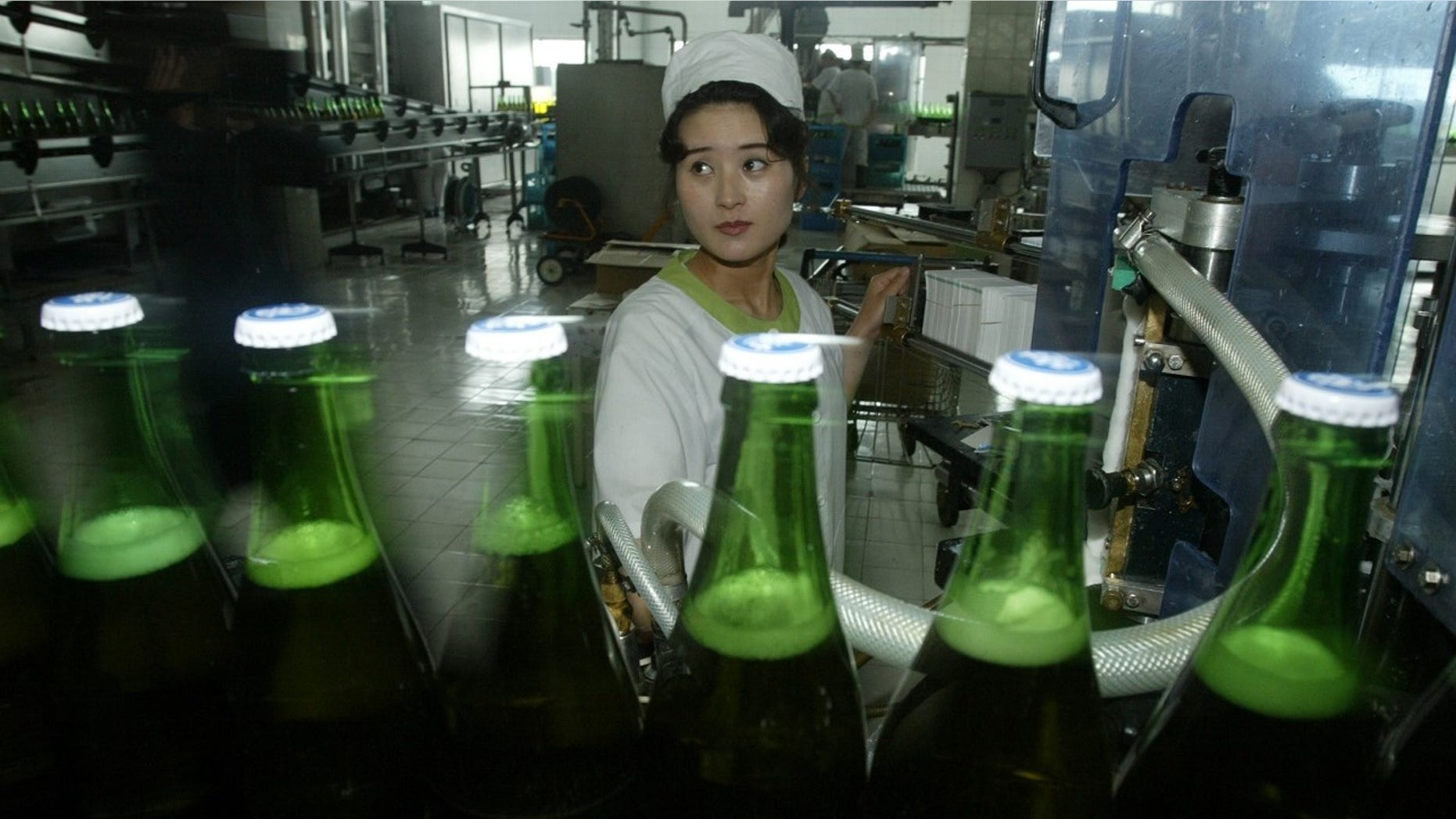 North Korean women work at the Taedonggang Beer factory in 2008.