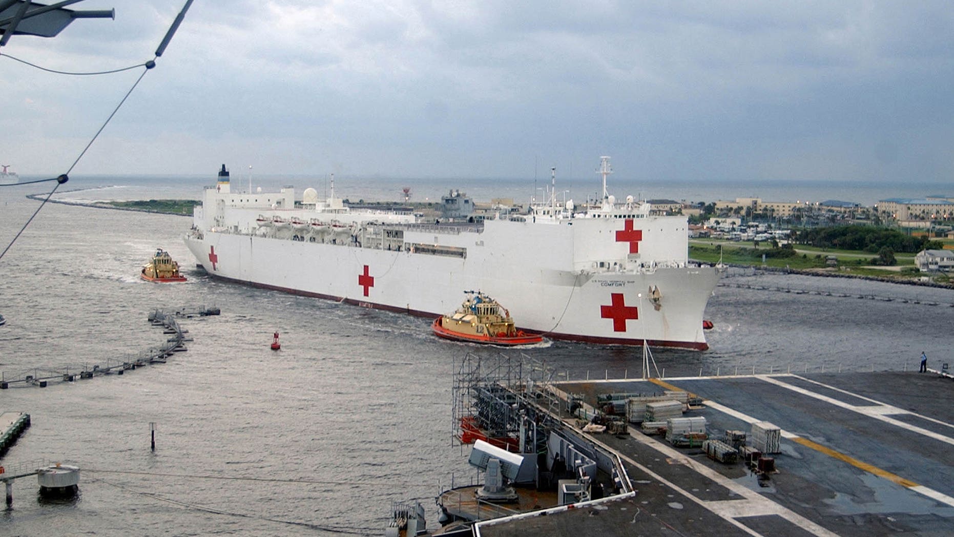 The Military Sealift Command (MSC) hospital ship USNS Comfort (T-AH 20) pulls into Naval Station Mayport, Florida, September 5, 2005, to take on supplies on their way to aid victims of Hurricane Katrina. The Navy's involvement in the Hurricane Katrina humanitarian assistance operations is led by the Federal Emergency Management Agency in conjunction with the Department of Defense.