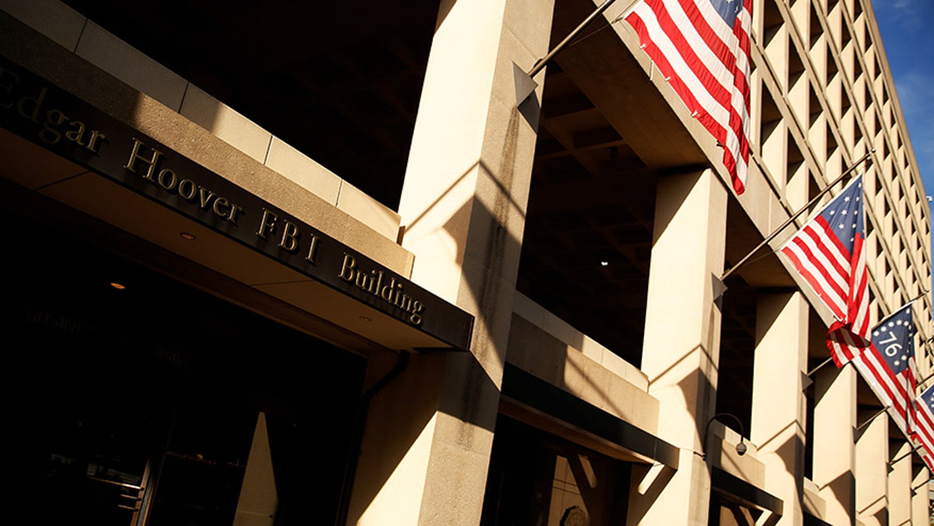 FBI agent David Raynor killed his estranged wife and then himself, officials said.