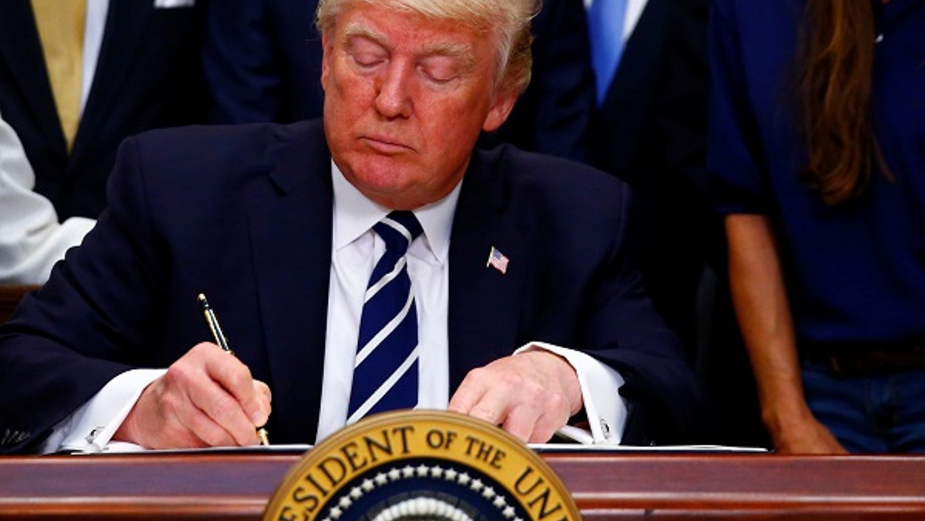 U.S. President Donald J. Trump delivers remarks on "Apprenticeship and Workforce of Tomorrow" initiatives and signs an executive order at the White House in Washington, U.S. June 15, 2017. REUTERS/Eric Thayer - RTS178NS