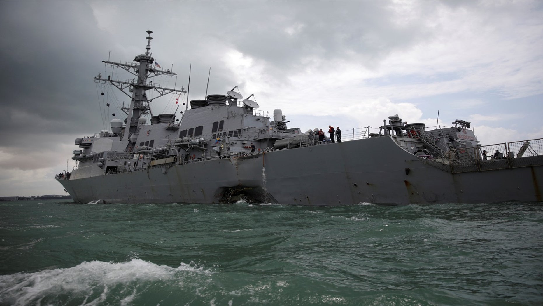 The U.S. Navy guided-missile destroyer USS John S. McCain is seen after a collision, in Singapore waters, Aug. 21, 2017.