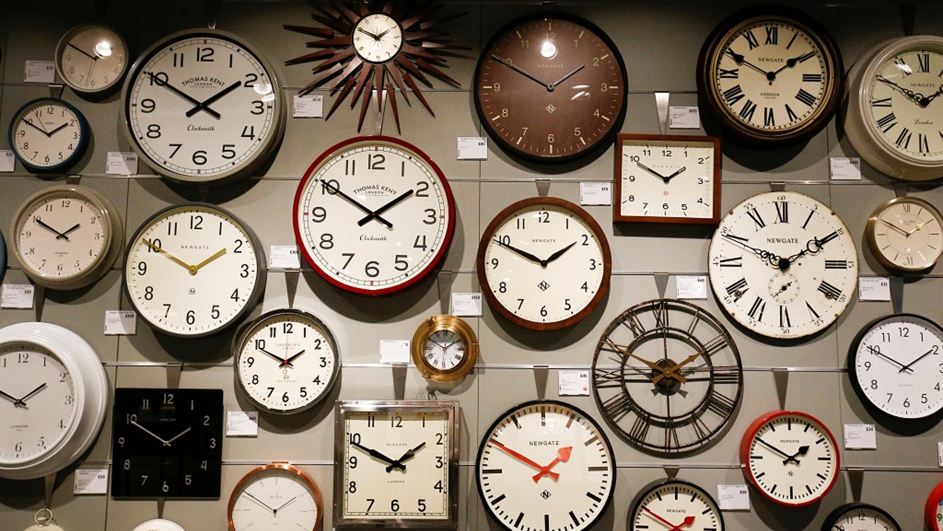 Clocks are displayed inside the new John Lewis store at the Westfield shopping centre in White City, London, Britain, March 19, 2018.