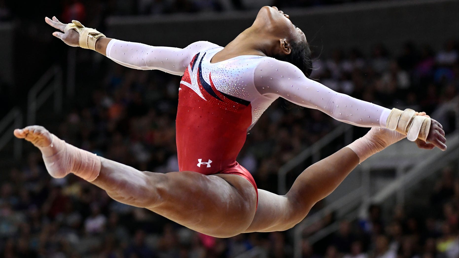 Jul 10, 2016; San Jose, CA, USA; Gabby Douglas during the floor exercise in the women's gymnastics U.S. Olympic team trials at SAP Center. Mandatory Credit: Robert Hanashiro-USA TODAY Sports - RTSHAD1