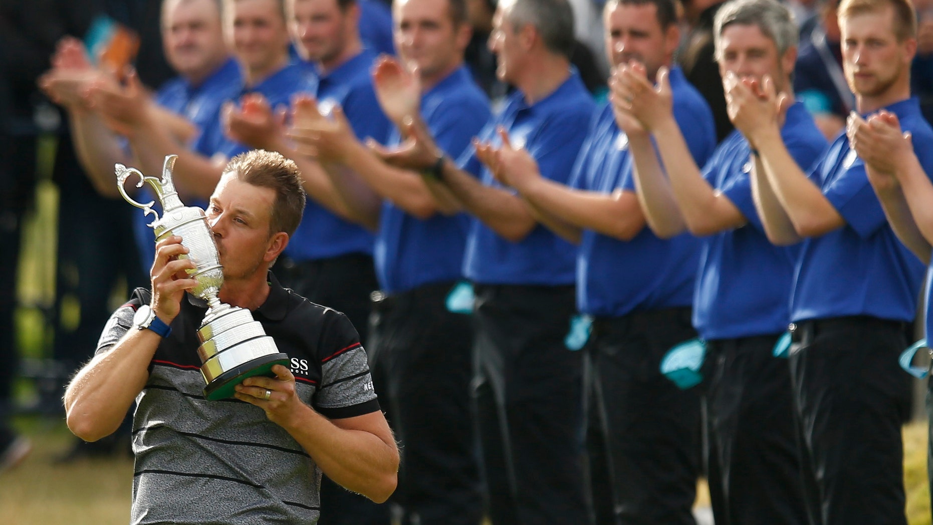 Sweden's Henrik Stenson celebrates winning the British Open.