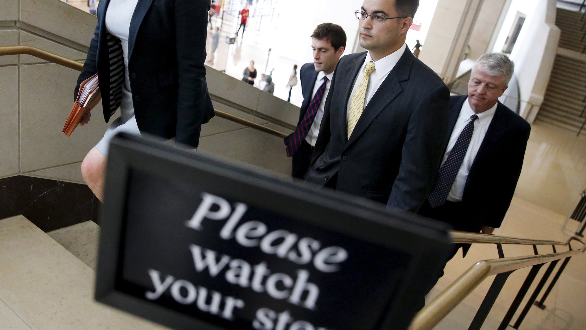 Sept. 10, 2015: Bryan Pagliano (2nd R), aide to former U.S. Secretary of State Hillary Clinton, departs with his legal team after appearing at a private session of the House Select Committee on Benghazi at the U.S. Capitol in Washington.