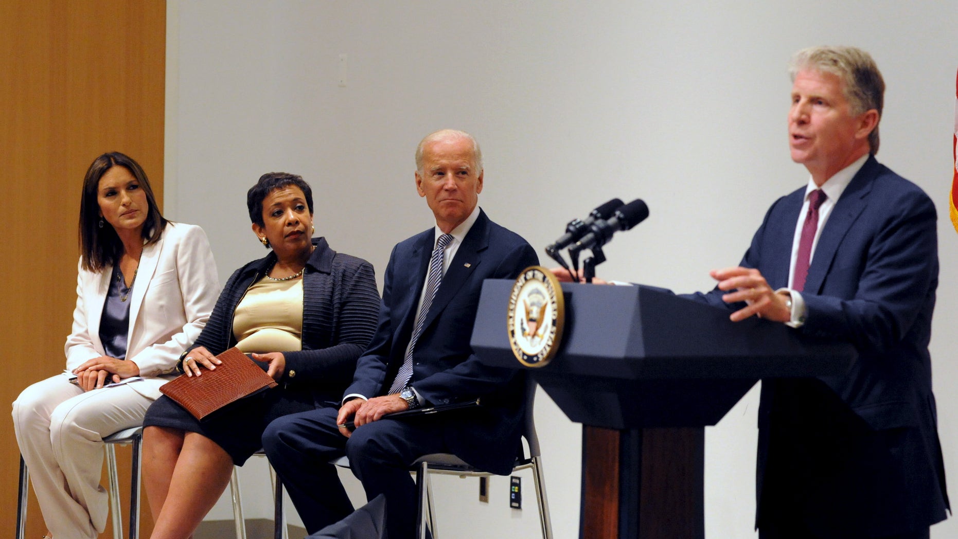 Manhattan District Attorney Cyrus R. Vance (R) speaks at the podium as U.S. Vice President Joe Biden and U.S. Attorney General Loretta B. Lynch look on with actress Mariska Hargitay (L) during an news conference in New York, September 10, 2015. The three were announcing the award of approximately $80 million in grants to eliminate backlogs of untested sexual assault evidence kits or "rape kits."