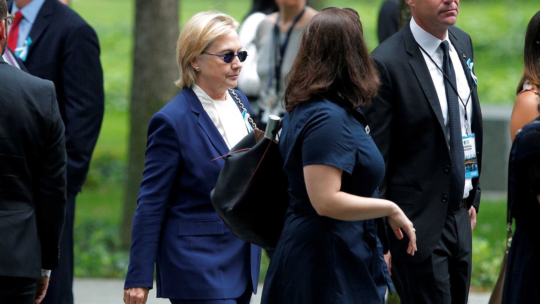 U.S. Democratic presidential candidate Hillary Clinton arrives for ceremonies to mark the 15th anniversary of the September 11 attacks at the National 9/11 Memorial in New York, New York, United States September 11, 2016. REUTERS/Brian Snyder - RTSN7US
