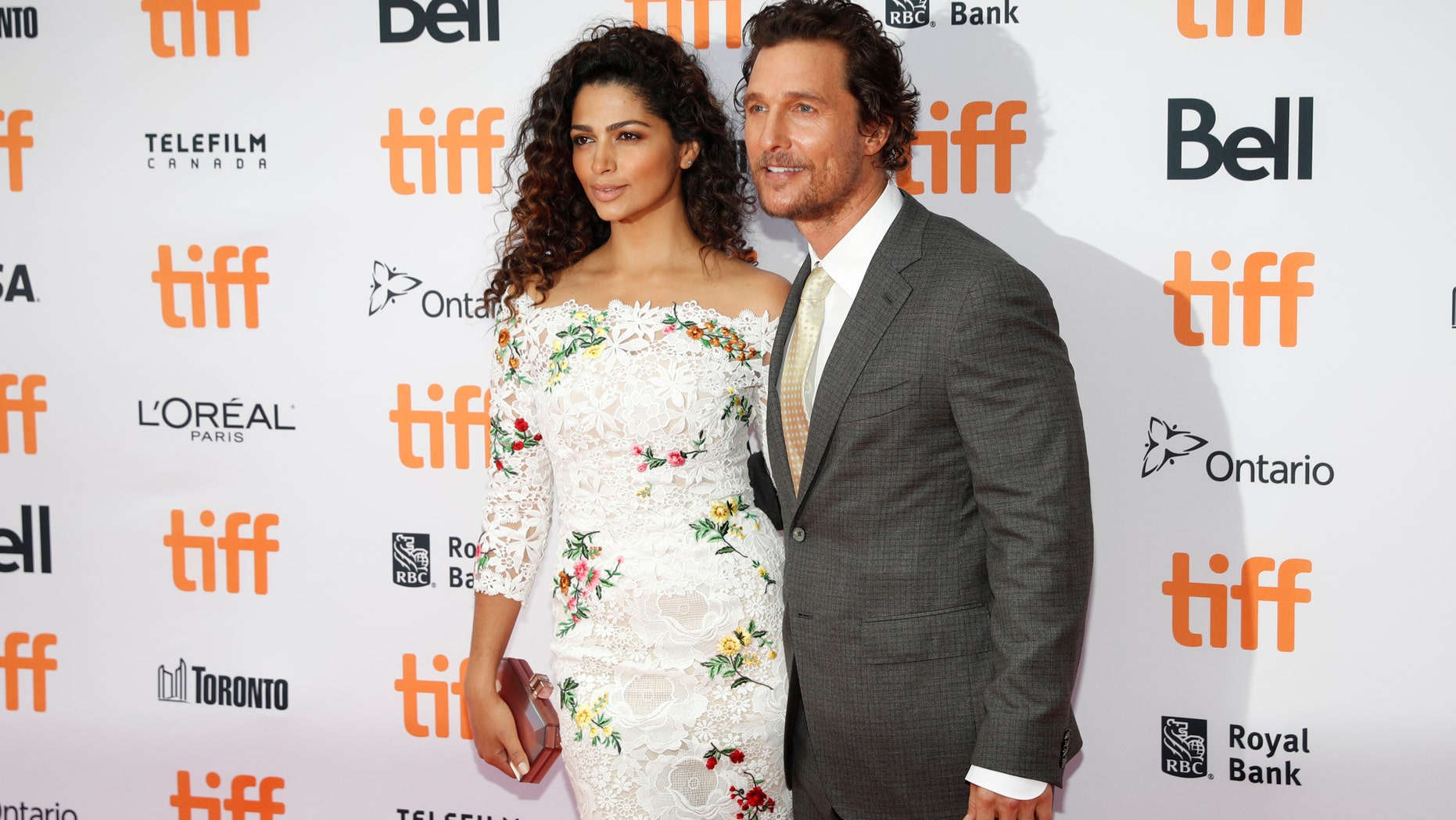 Actor Matthew McConaughey arrives with his wife Camila Alves on the red carpet for the film "Sing" during the Toronto International Film Festival (TIFF) in Toronto, Canada, September 11, 2016.