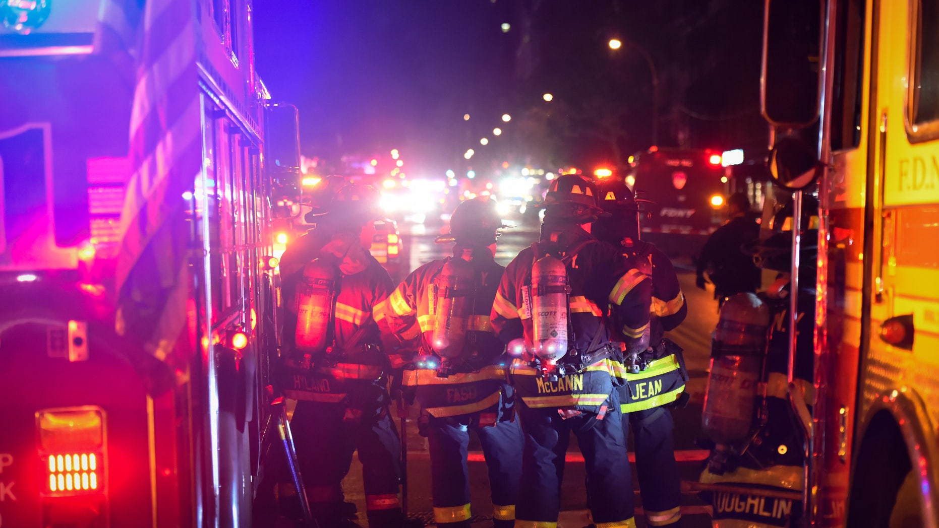New York City firefighters stand near the site of an explosion in the Chelsea neighborhood of Manhattan, New York, U.S. September 17, 2016. (REUTERS/Rashid Umar Abbasi)