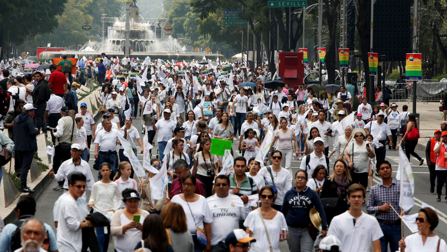 Protesters arriving to march against the legalization of gay marriage, near the Angel of Independence monument in Mexico City.