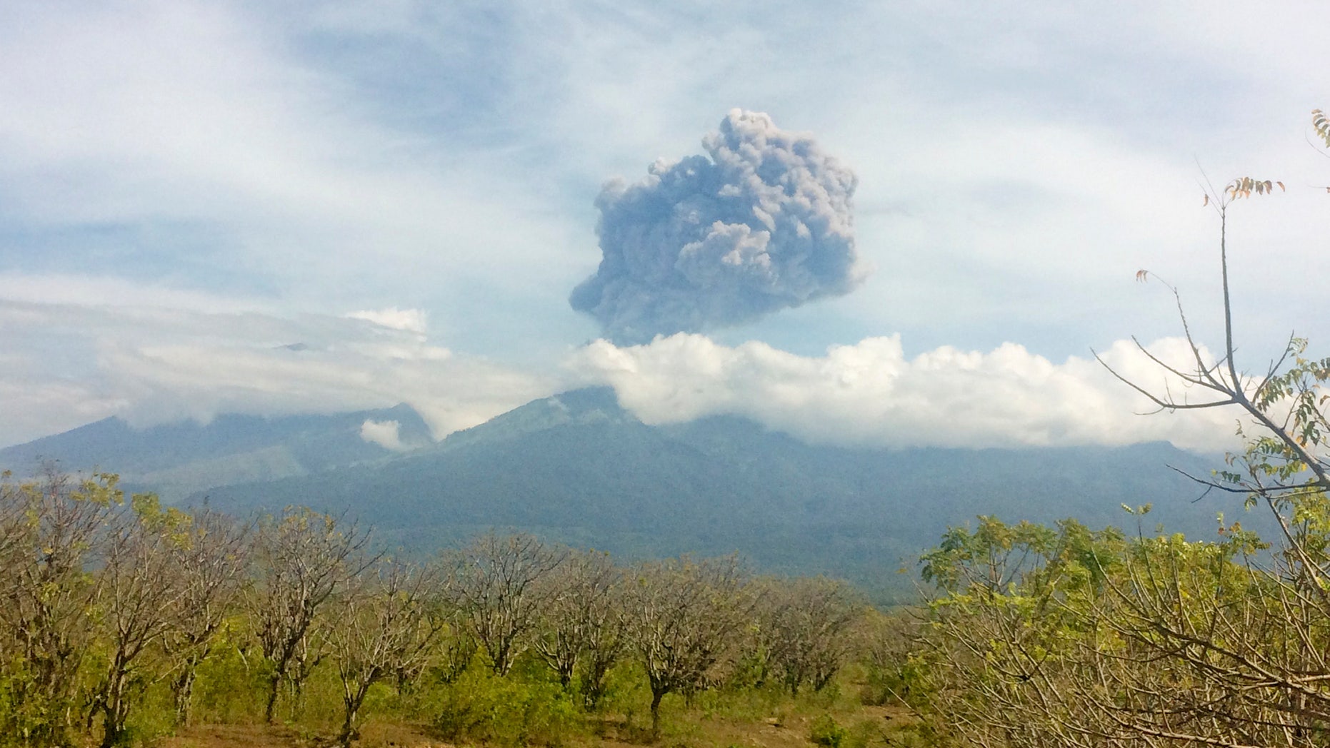 Mount Barujari, located inside Mount Rinjani volcano, is seen erupting from Bayan district, North Lombok, Indonesia.
