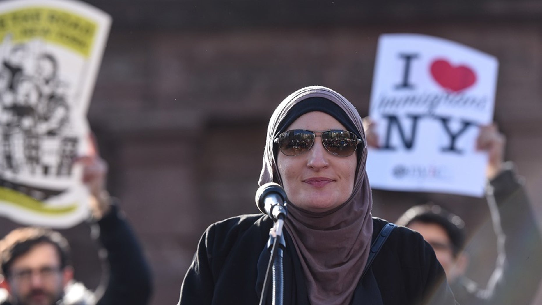 FILE -- Activist Linda Sarsour addresses the crowd during a protest against President Donald Trump's travel ban, in New York City, U.S. January 29, 2017.