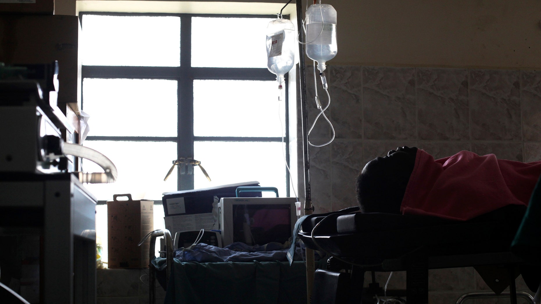 A woman rests after undergoing an obstetric fistula operation at the Juba Teaching Hospital in South Sudan, November 8, 2013. According to a Ministry of Health official, it is estimated that there are around 60,000 women with fistula, which are serious injuries caused by childbirth and a major cause of maternal mortality, in South Sudan. A Fistula Eradication campaign, which started on November 3 and