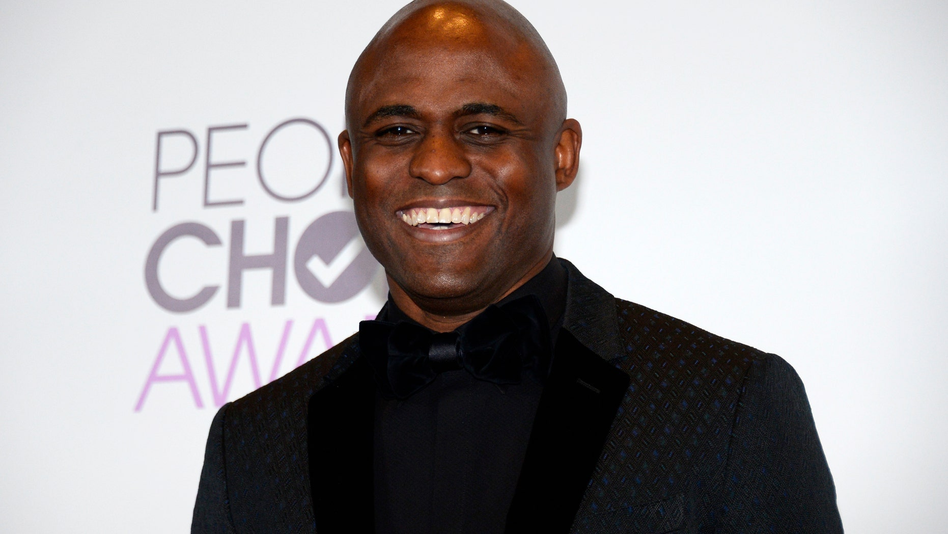 Wayne Brady poses backstage at the 2014 People's Choice Awards in Los Angeles, California January 8, 2014.