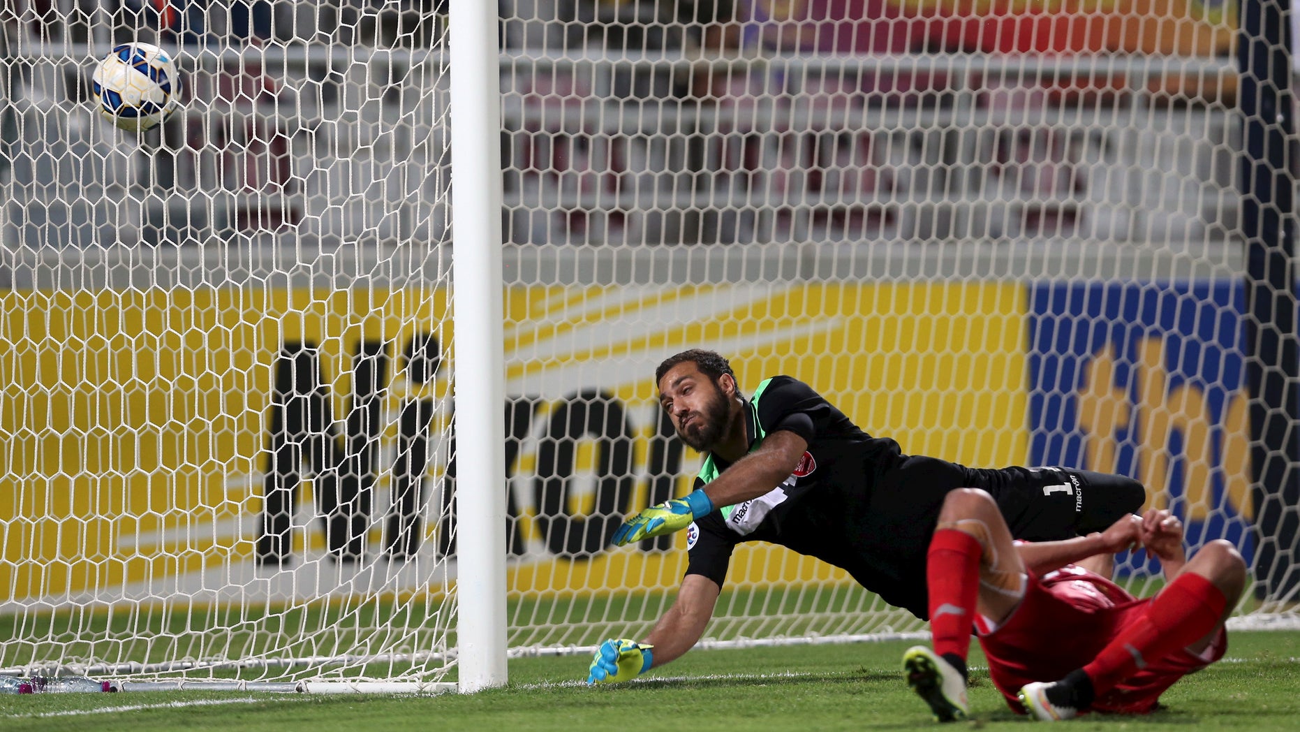 April 22, 2015: Youssef Msakni scores a goal against Sousha Makani during their AFC Champions League. (Reuters)