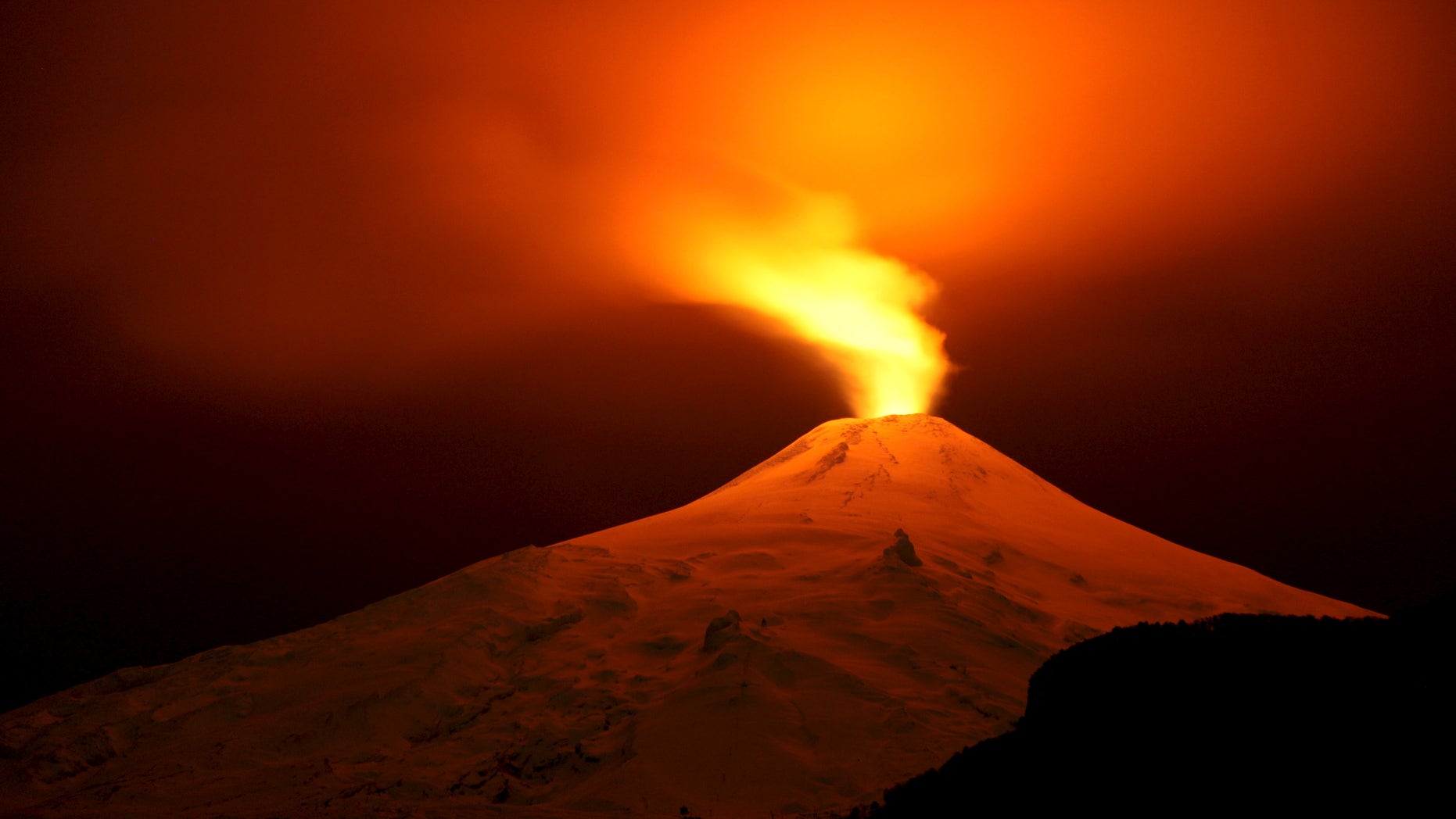 The Villarrica Volcano is seen at night from Pucon town, Chile, July 11, 2015.
