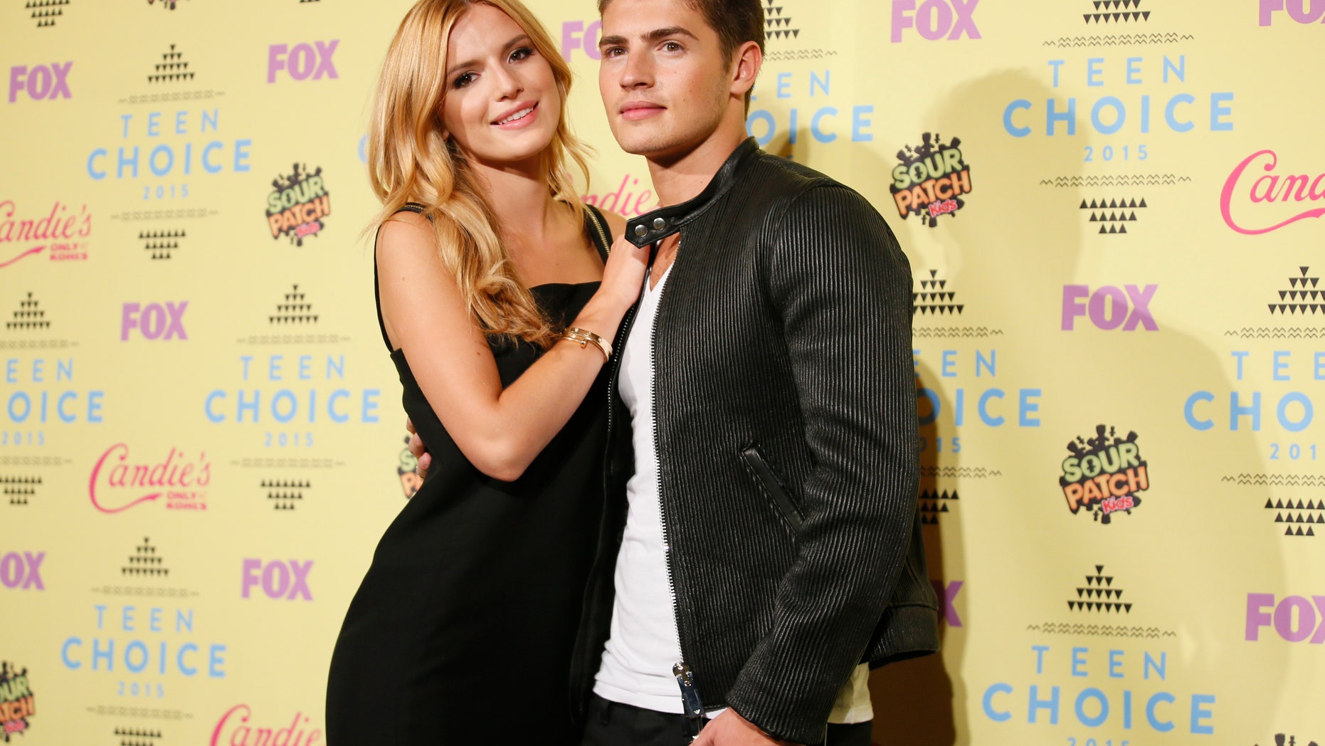Actors Bella Thorne and Gregg Sulkin pose backstage at the 2015 Teen Choice Awards in Los Angeles, California, United States August 16, 2015.