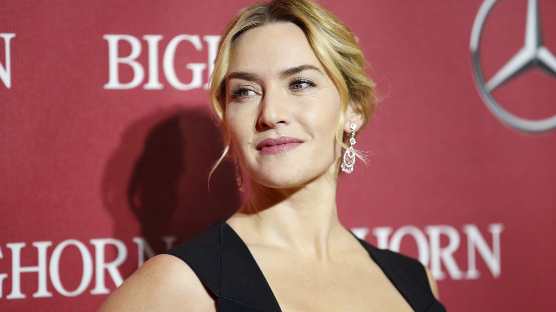 Actress Kate Winslet poses at the 27th Annual Palm Springs International Film Festival Awards Gala in Palm Springs, California, January 2, 2016. REUTERS/Danny Moloshok - RTX20U4Q
