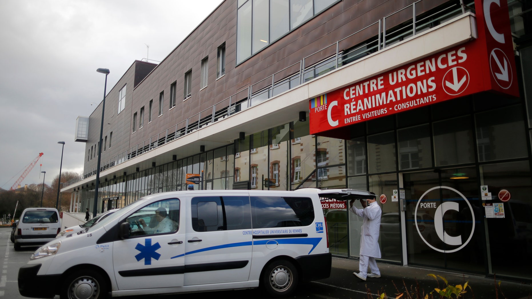 An ambulance is seen outside the Emergency Entrance at the CHU de Rennes hospital, in Rennes, France. REUTERS/Stephane Mahe