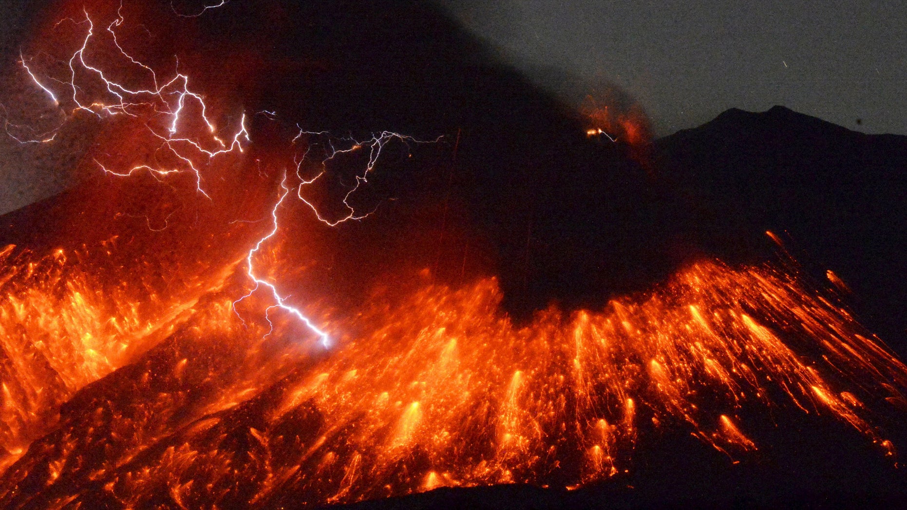 Volcanic lightning is seen at an eruption of Mount Sakurajima, in this photo taken from Tarumizu city, Kagoshima prefecture, southwestern Japan, taken by Kyodo February 5, 2016.