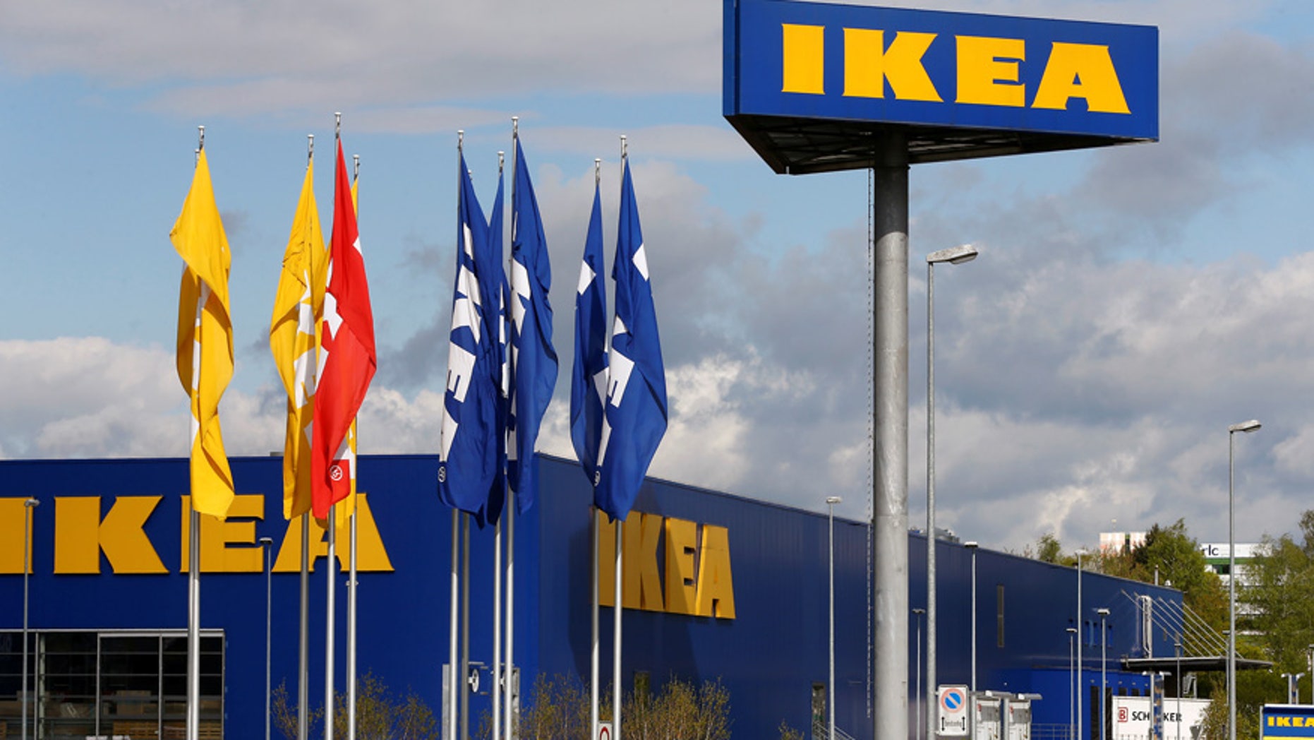 The company's logo is seen outside of an IKEA Group store in Spreitenbach, Switzerland April 27, 2016. REUTERS/Arnd Wiegmann - RTX2C60C