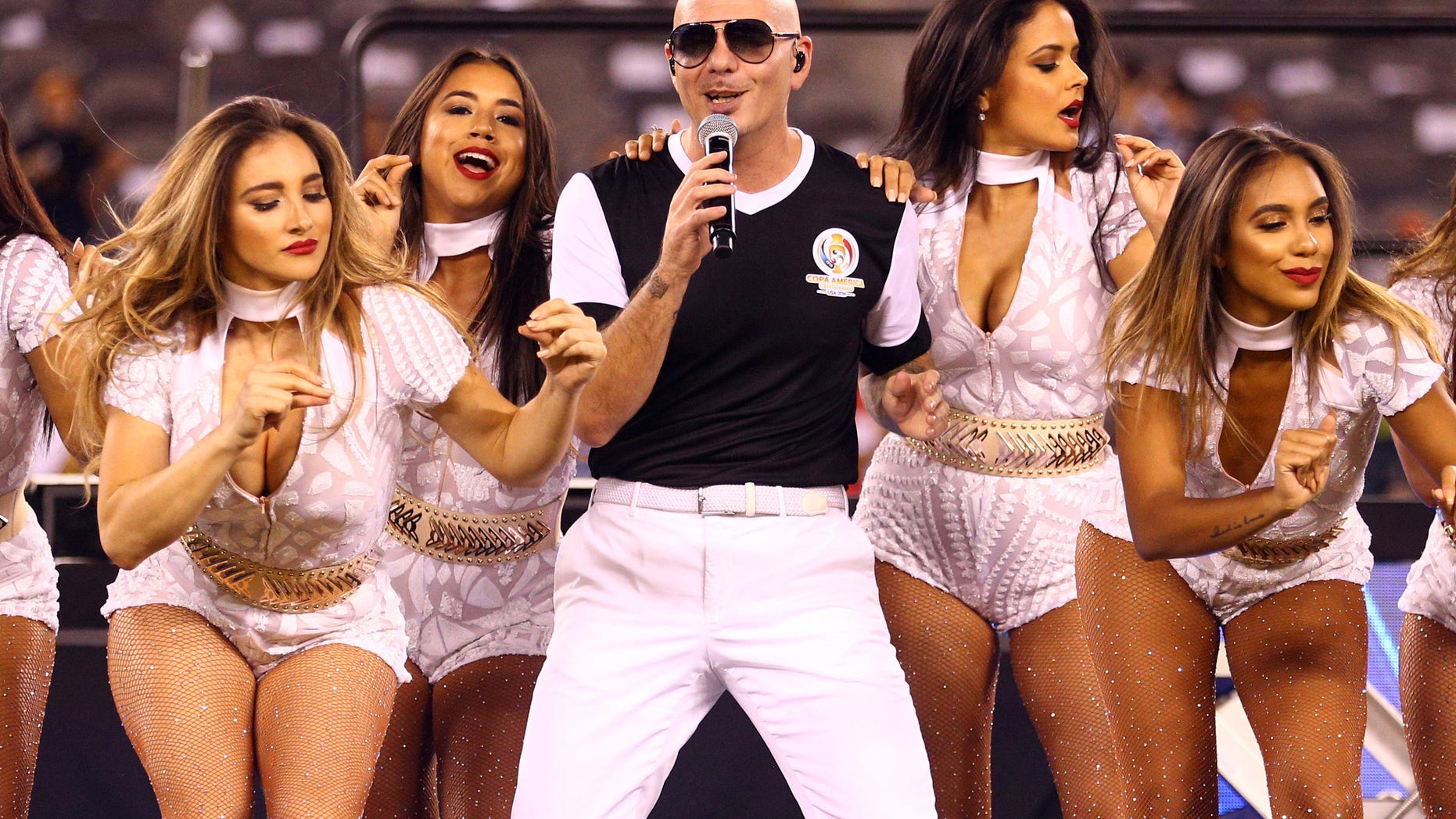 Jun 26, 2016; East Rutherford, NJ, USA; Recording artist Pitbull performs after the championship match of the 2016 Copa America Centenario soccer tournament at MetLife Stadium. Chile defeated Argentina 0-0 (4-2). Mandatory Credit: Brad Penner-USA TODAY Sports - RTX2IDRC